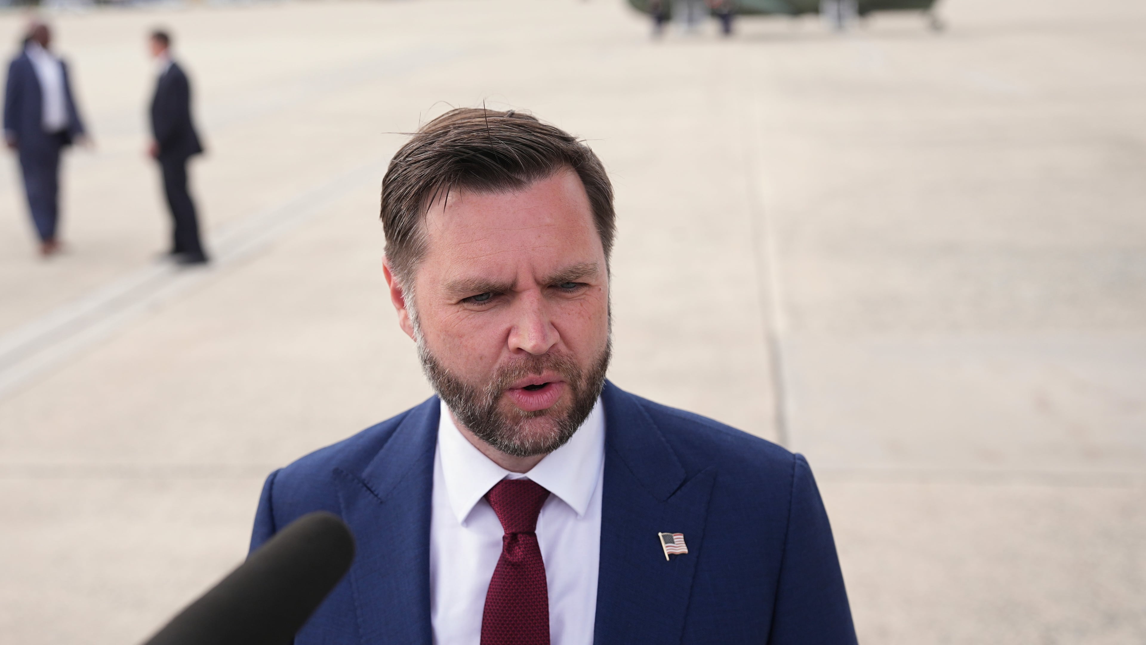 With Marine Two in the background, Vice President JD Vance speaks with reporters upon arriving at Joint Base Andrews, Md., Thursday, May 28, 2026. (AP Photo/Matt Rourke, Pool)
