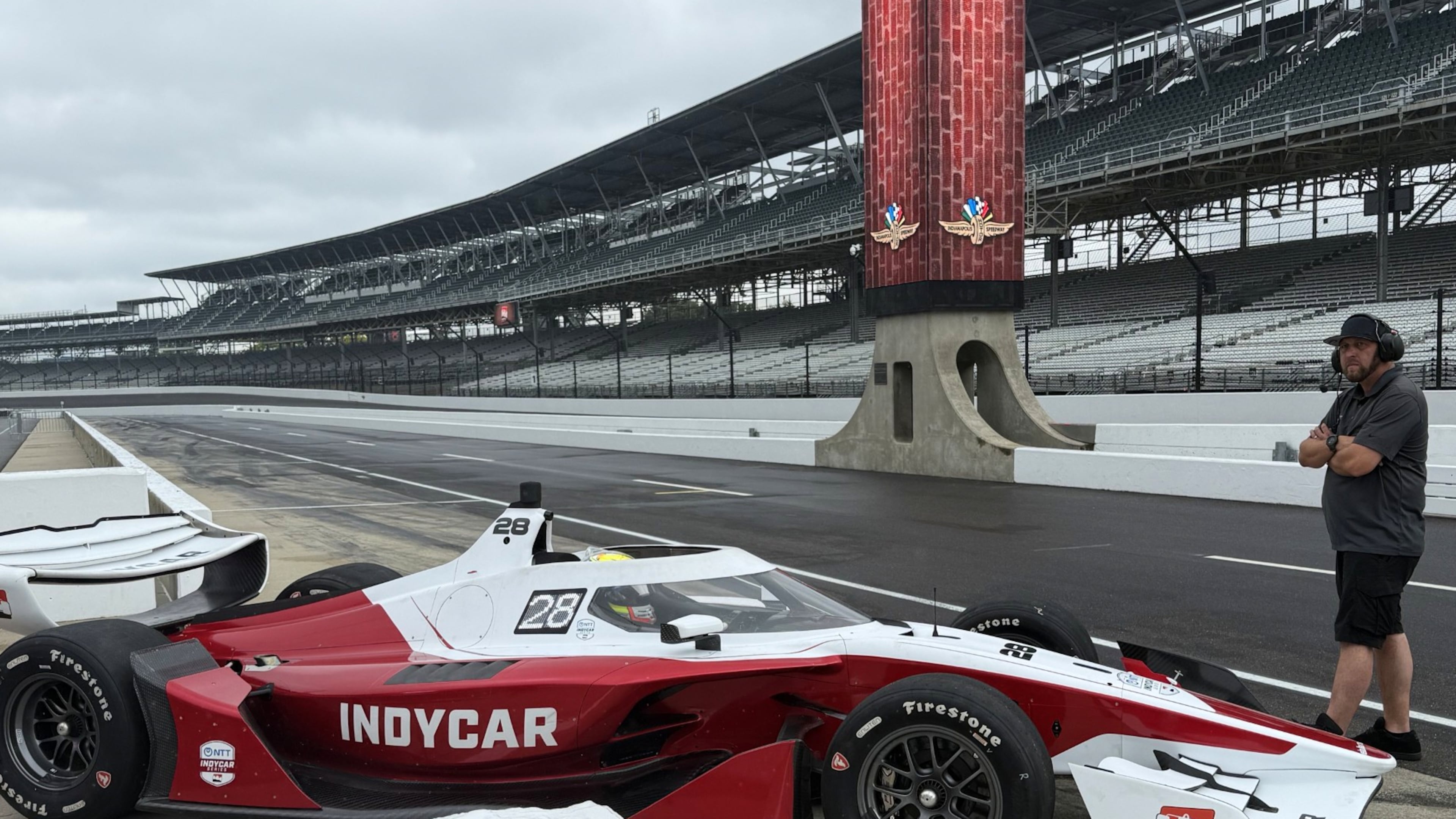 Reigning IndyCar champion Alex Palou drives into the pit lane to test a new IndyCar model, Sunday, Aug. 2, 2026, at Indianapolis Motor Speedway in Indianapolis. (AP Photo/Mike Marot)