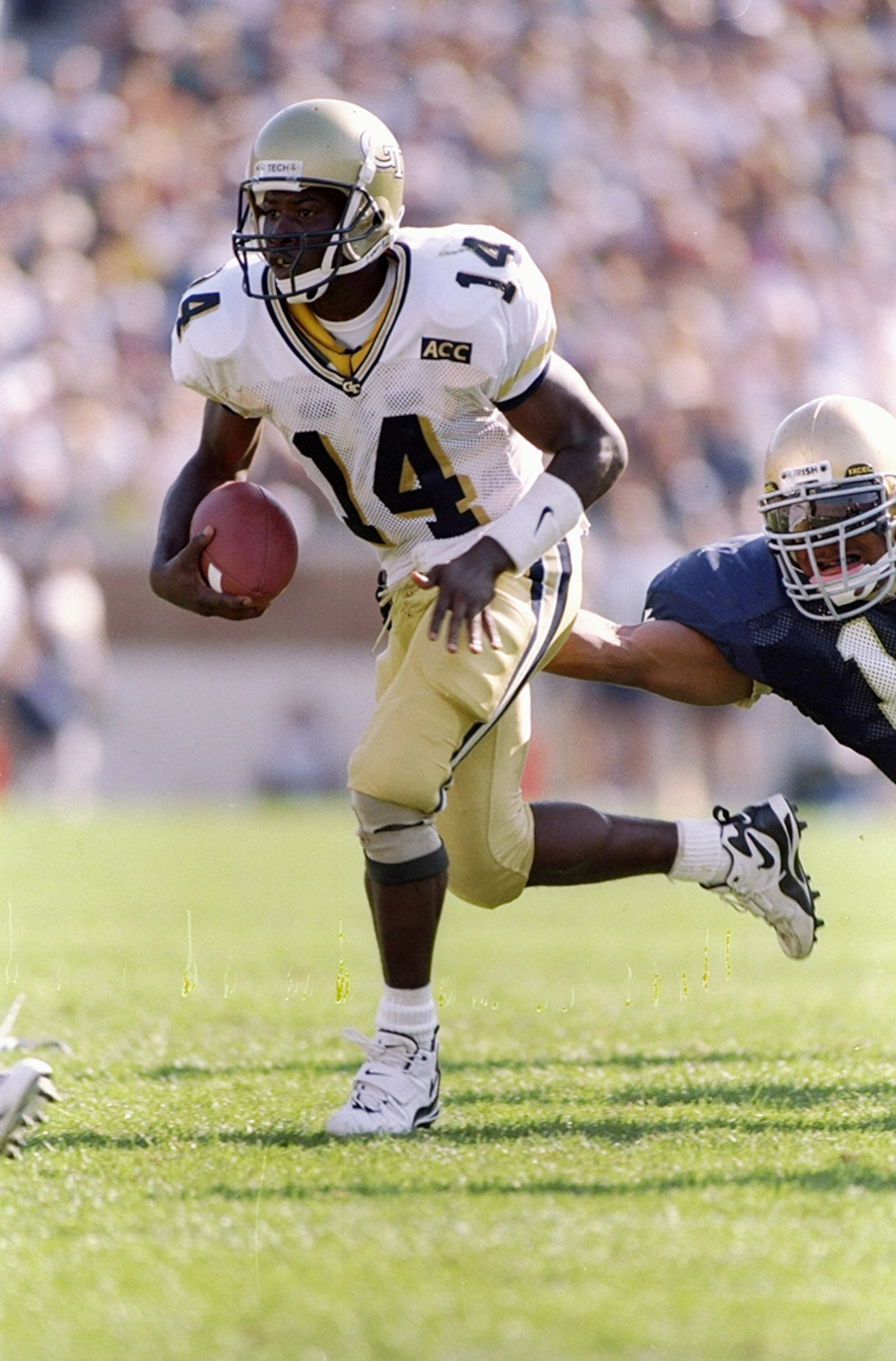 The most well-known Georgia Tech uniform is the combination of white jersey, gold pants and gold helmet worn during the Jackets' 1950's heyday. The GT wasn't added to the Jackets' helmet until 1967.