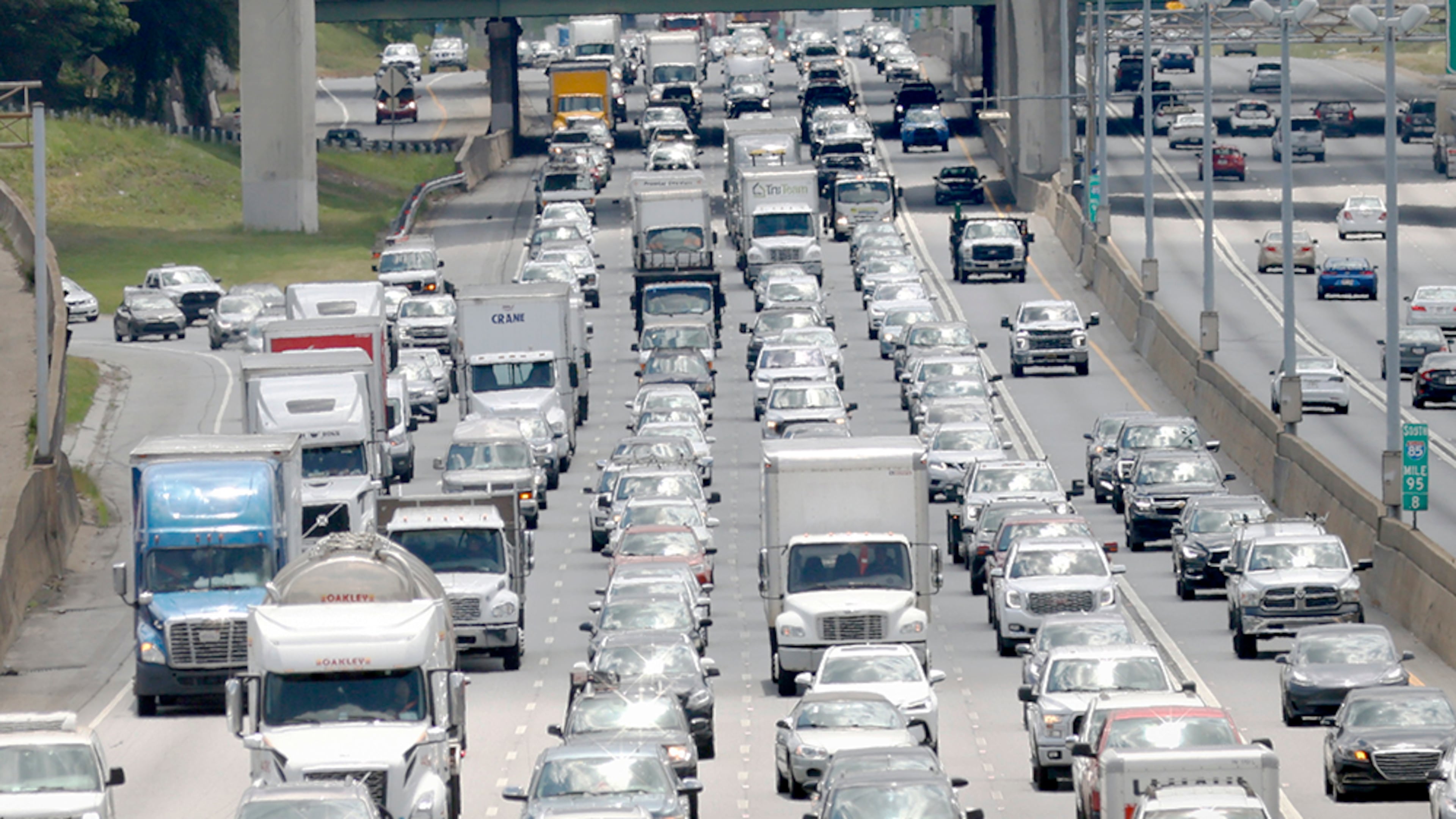 AAA forecasts a record 45.1 million Americans will travel over Memorial Day weekend this year. (Miguel Martinez/AJC)