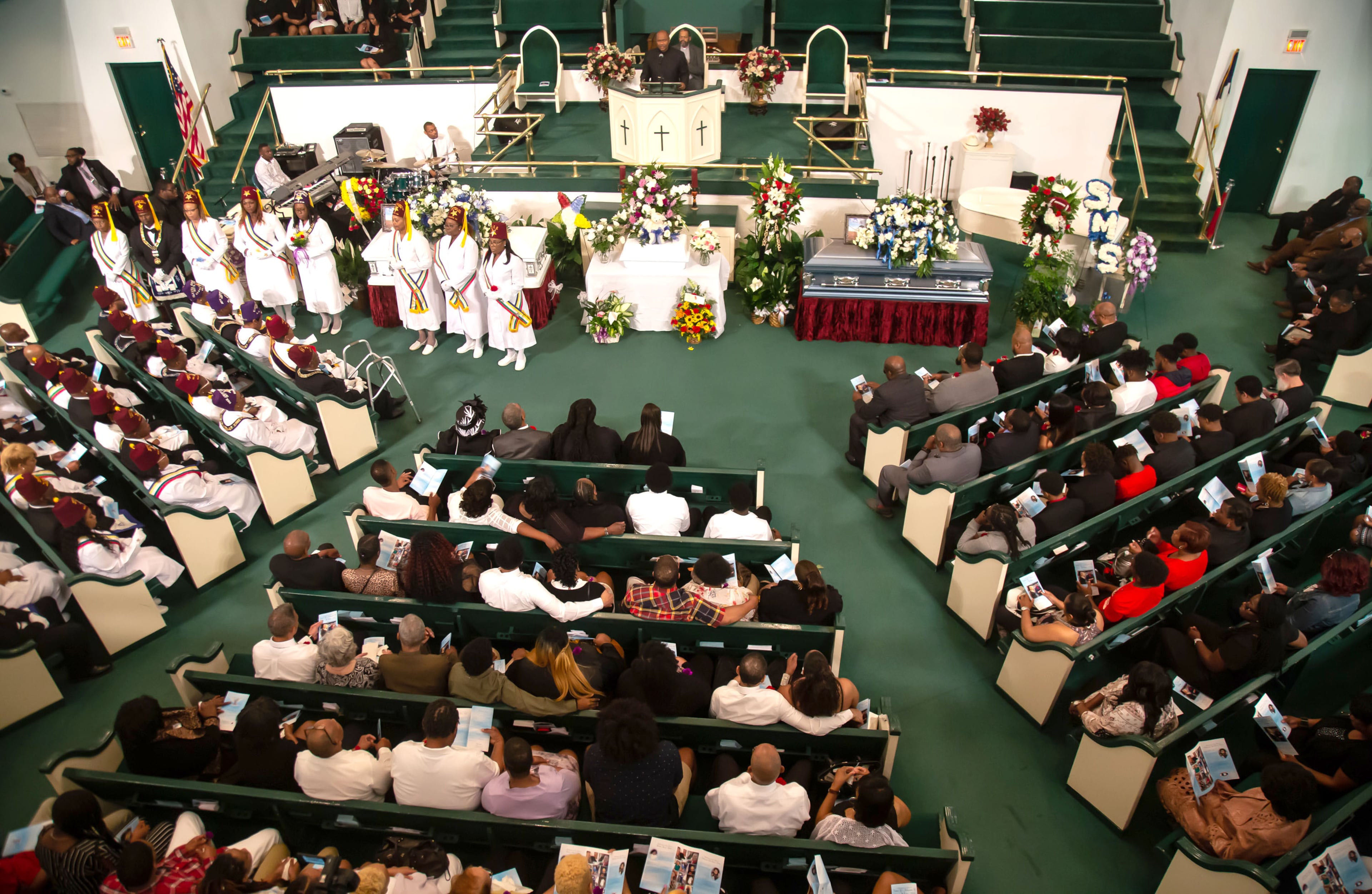 Reverend David B. Bowie delivers the Eulogy for Sandra White and her son Arkeyvion White at the Mount Carmel Baptist Church Saturday, April 13, 2019, in Atlanta. Sandra Arkeyvion White where killed during a 16-hour standoff April 4. STEVE SCHAEFER / SPECIAL TO THE AJC