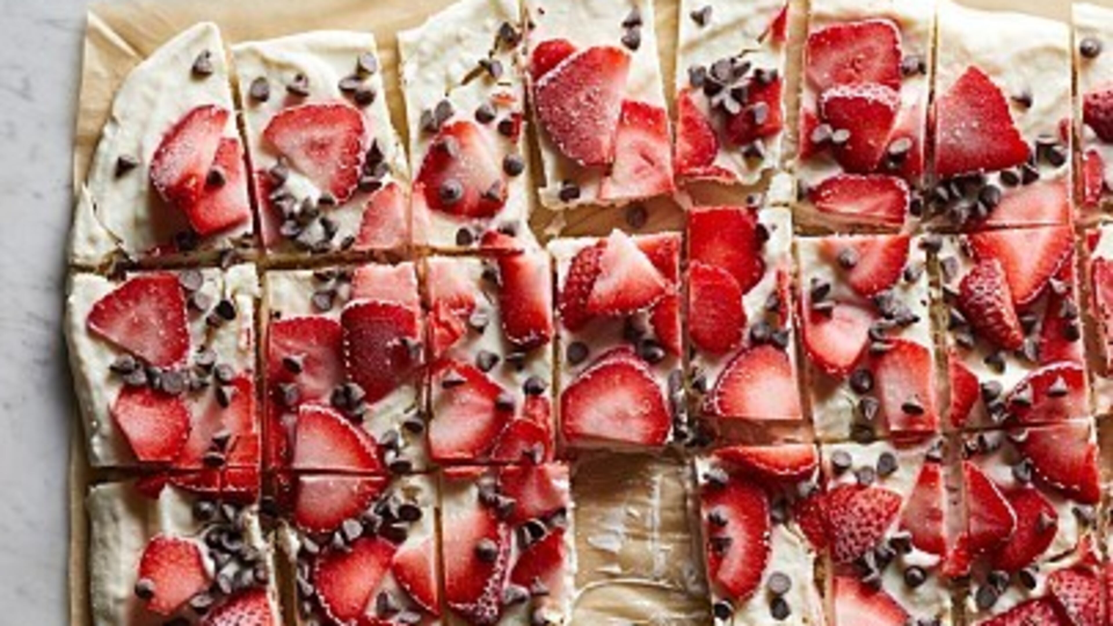 Eating Well's recipe for Strawberry-Chocolate Greek Yogurt Bark is just sweet enough and it's fun to cook with the kids.