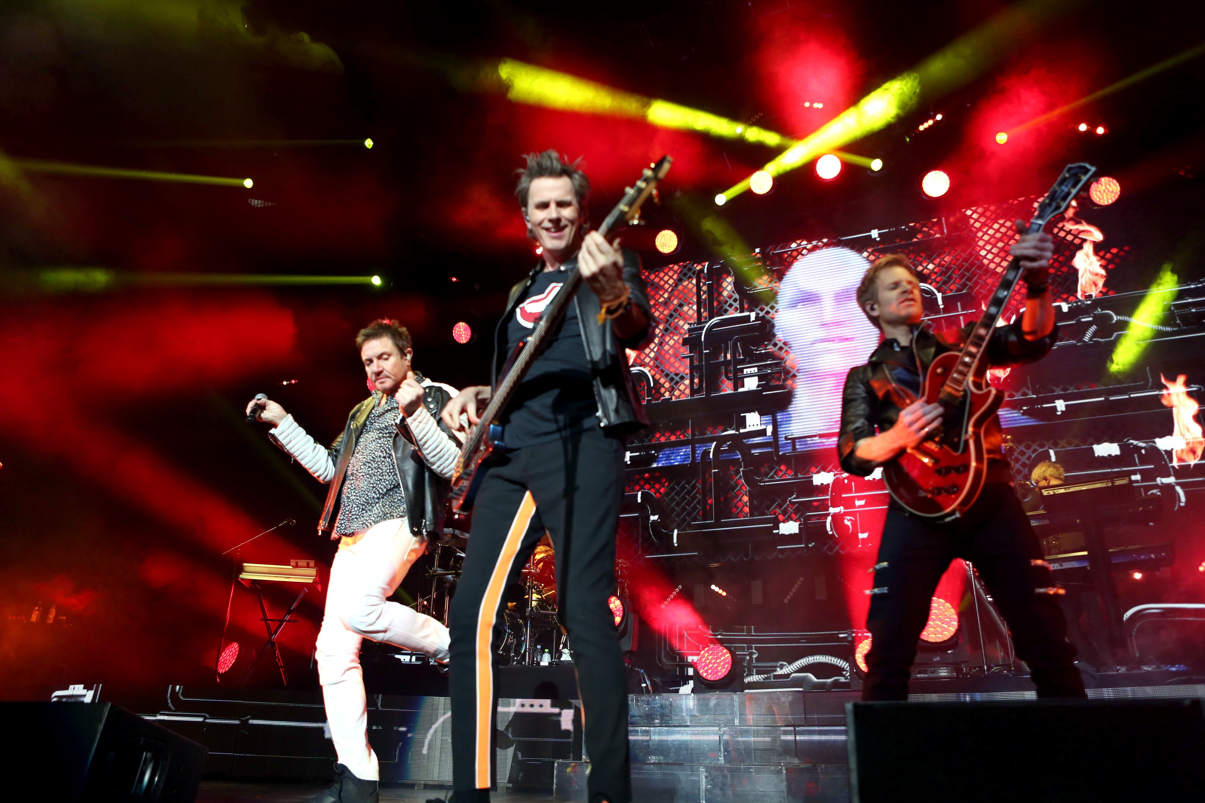 British rockers Duran Duran with lead singer Simon Le Bon, left, bassist John Taylor and guitarist Dom Brown. (Akili-Casundria Ramsess/Special to the AJC)