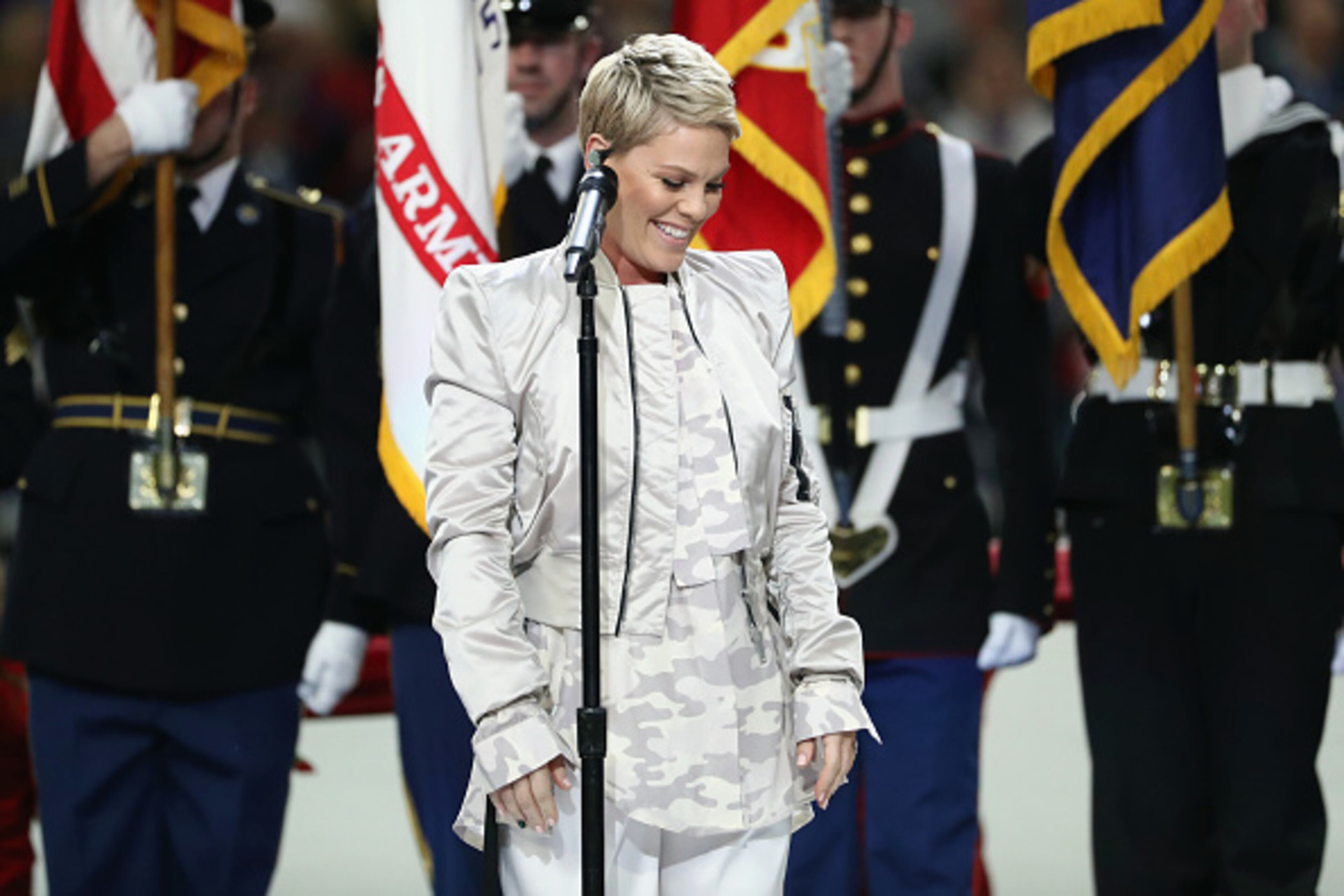 MINNEAPOLIS, MN - FEBRUARY 04: Pink sings the national anthem prior to Super Bowl LII between the New England Patriots and the Philadelphia Eagles at U.S. Bank Stadium on February 4, 2018 in Minneapolis, Minnesota. (Photo by Elsa/Getty Images)