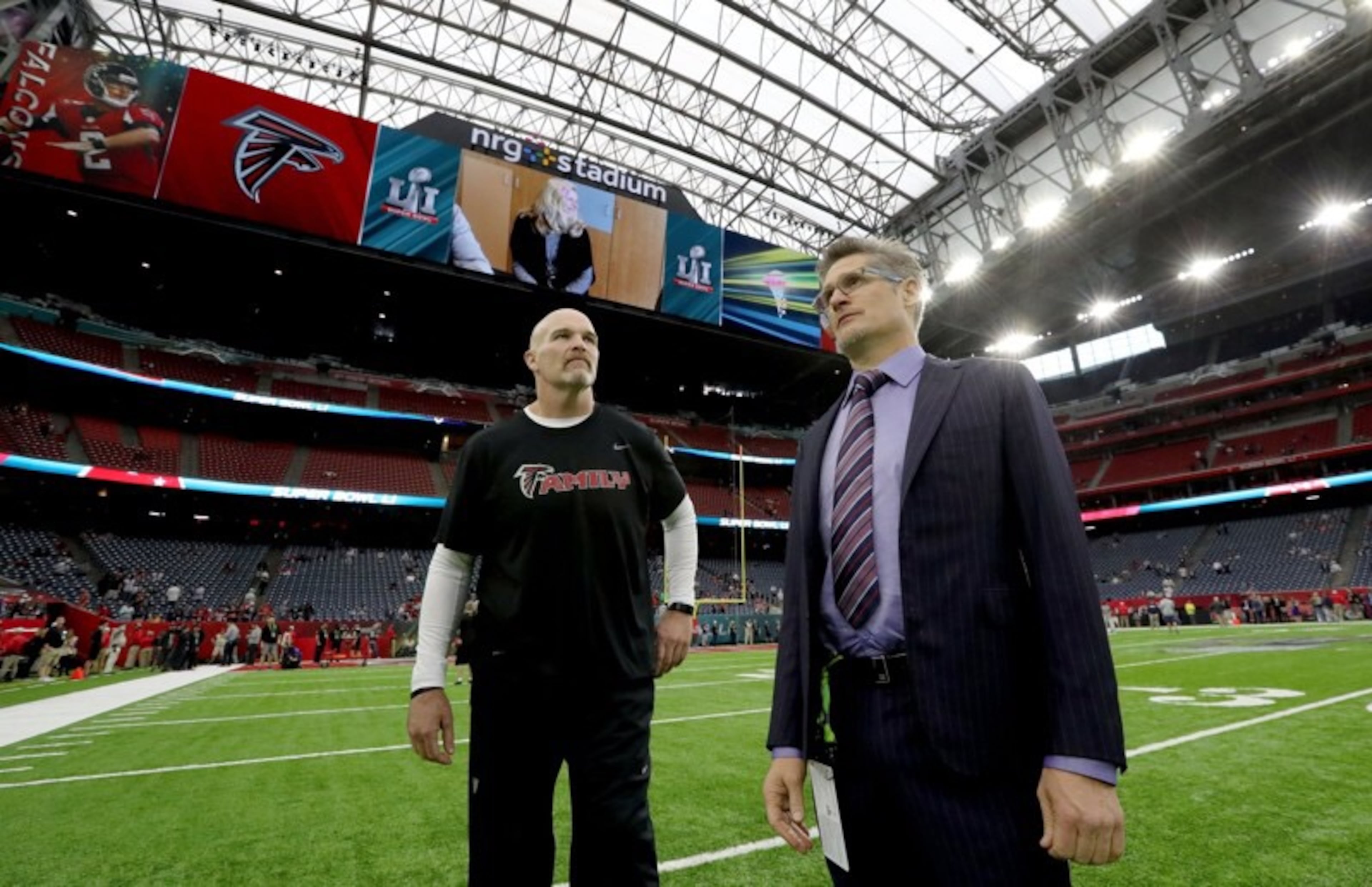FEBRUARY 5, 2017 HOUSTON TX Atlanta Falcons head coach Dan Quinn and general manager Thomas Dimtroff survey the stadium before the Atlanta Falcons meet the New England Patriots in Super Bowl LI at NRG Stadium in Houston, TX, Sunday, February 5, 2017. Curtis Compton/AJC