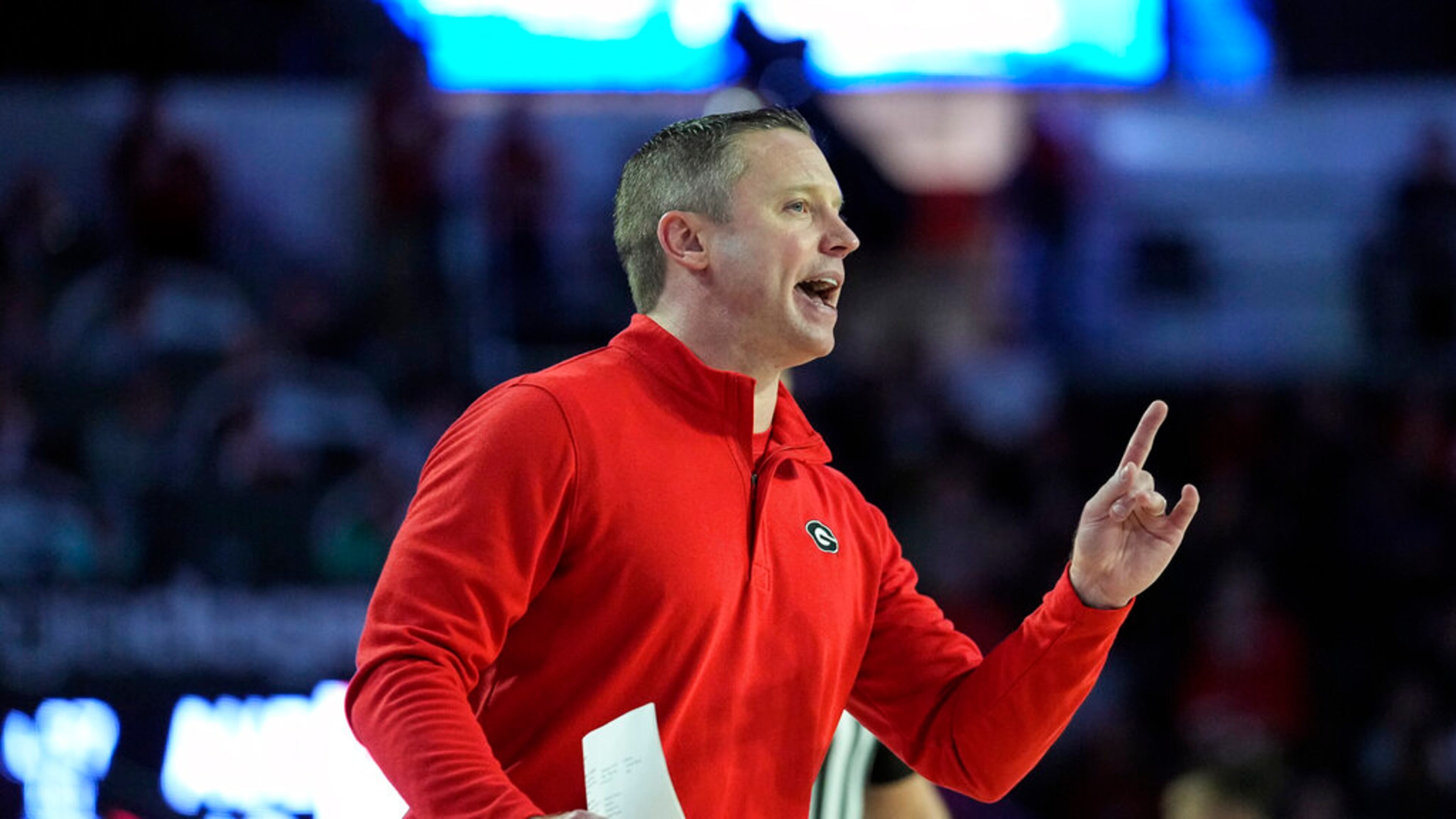 Georgia coach Mike White yells to his players on the court during the first half of an NCAA college basketball game against Auburn Wednesday, Jan. 4, 2023, in Athens, Ga. (AP Photo/John Bazemore)