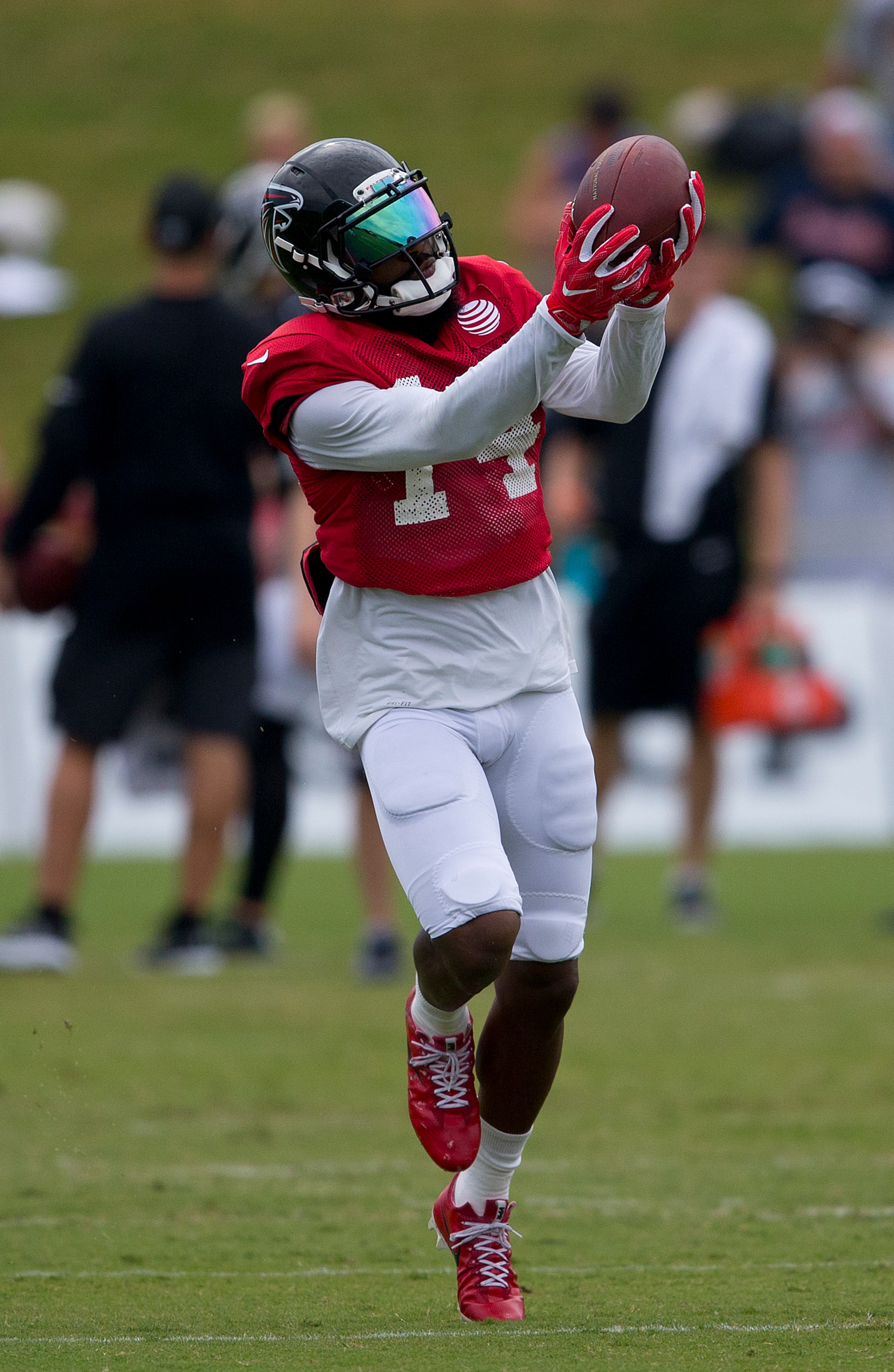 Justin Hardy (14) makes a catch during Wednesday's training camp practice.