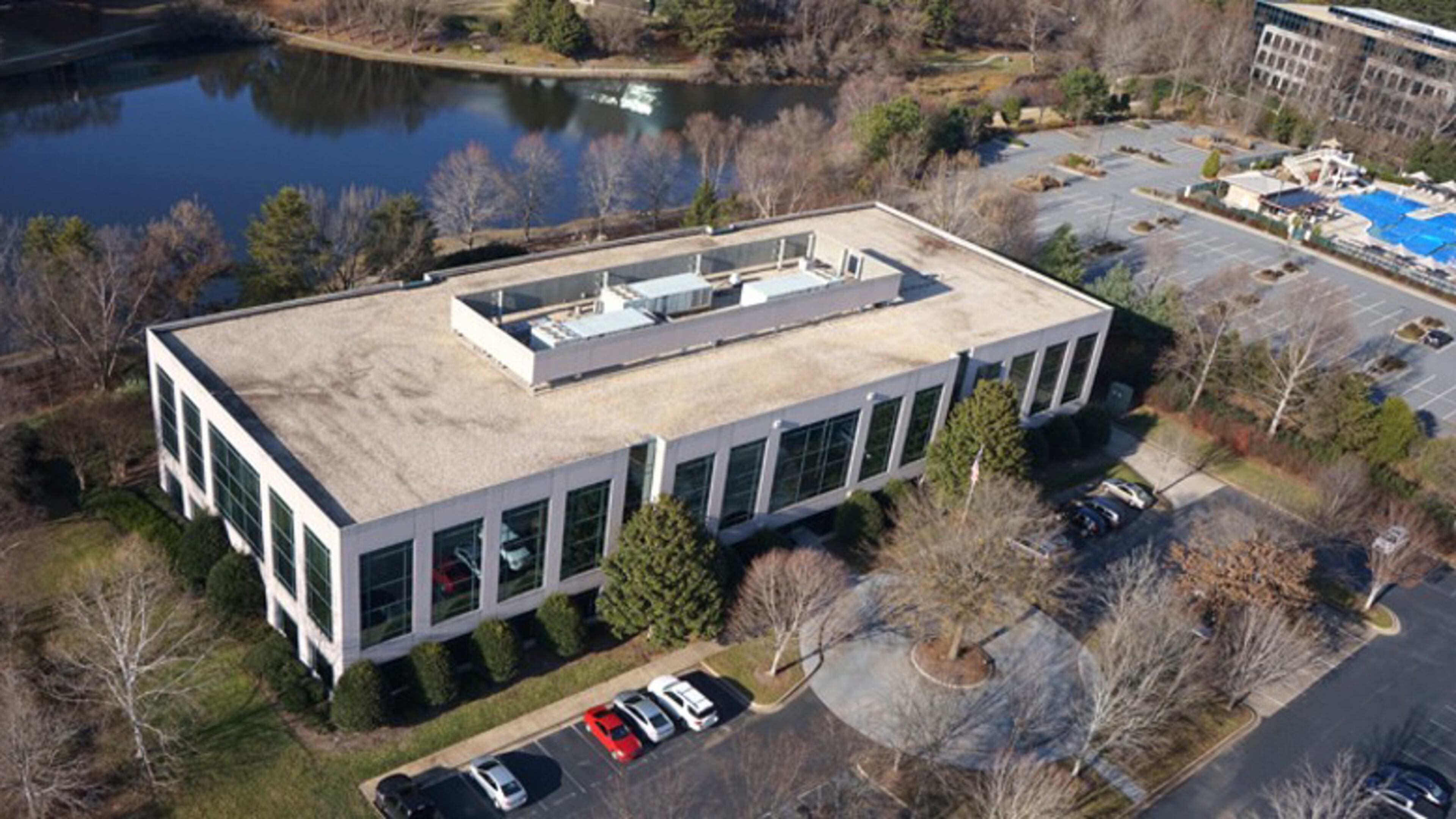 Johns Creek closed a $9.4 million deal in early 2017 to buy an existing building at 11360 Lakefield Drive in Technology Park to consolidate City Hall and fire, police and court functions. But it has had to negotiate an extension of its police department lease because occupancy in the new building is expected to be delayed at least a year. CITY OF JOHNS CREEK