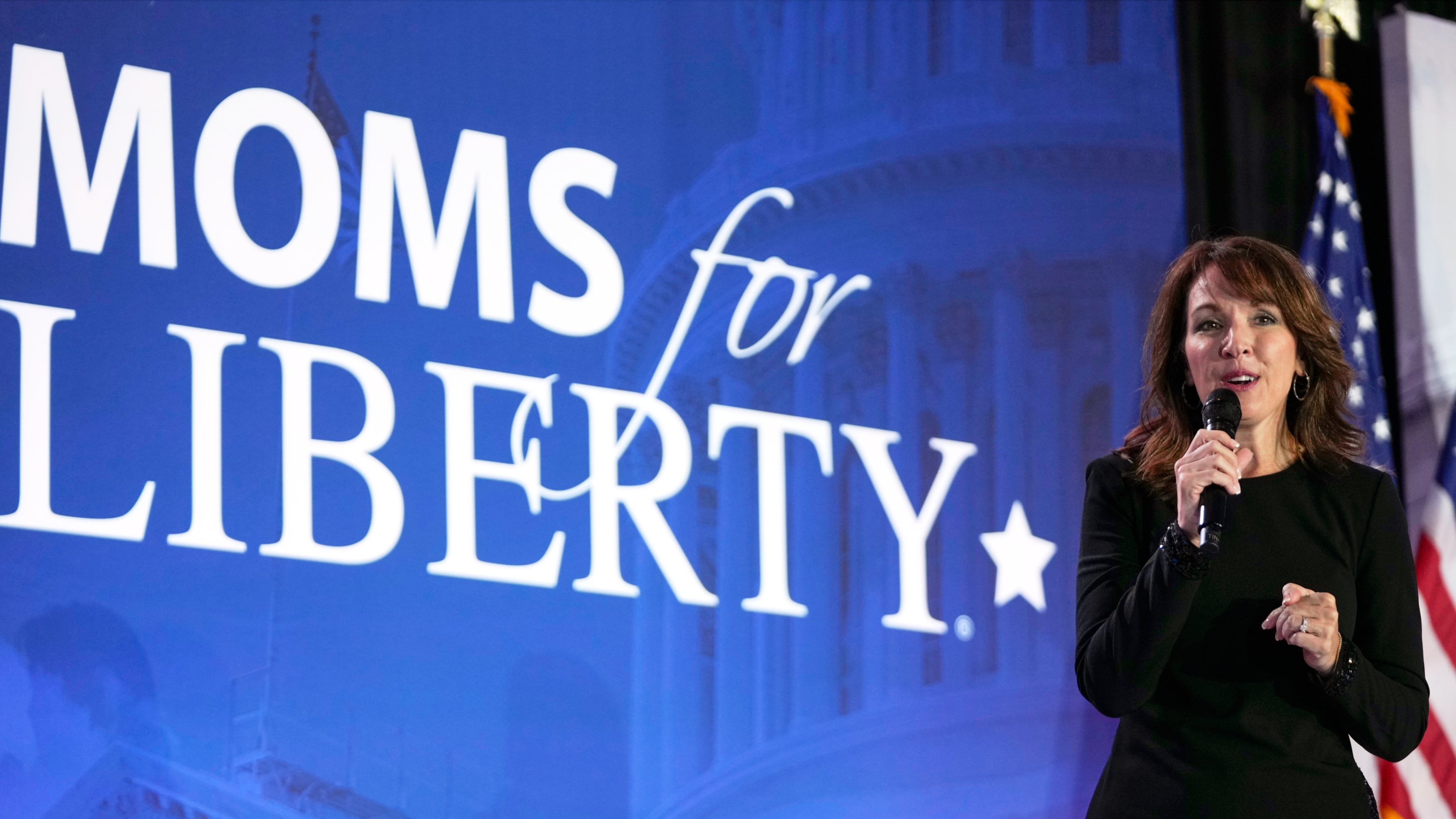 FILE - Moms for Liberty co-founder Tina Descovich speaks before Republican presidential nominee former President Donald Trump at the Moms for Liberty annual convention in Washington, Aug. 30, 2024. (AP Photo/Mark Schiefelbein, File)