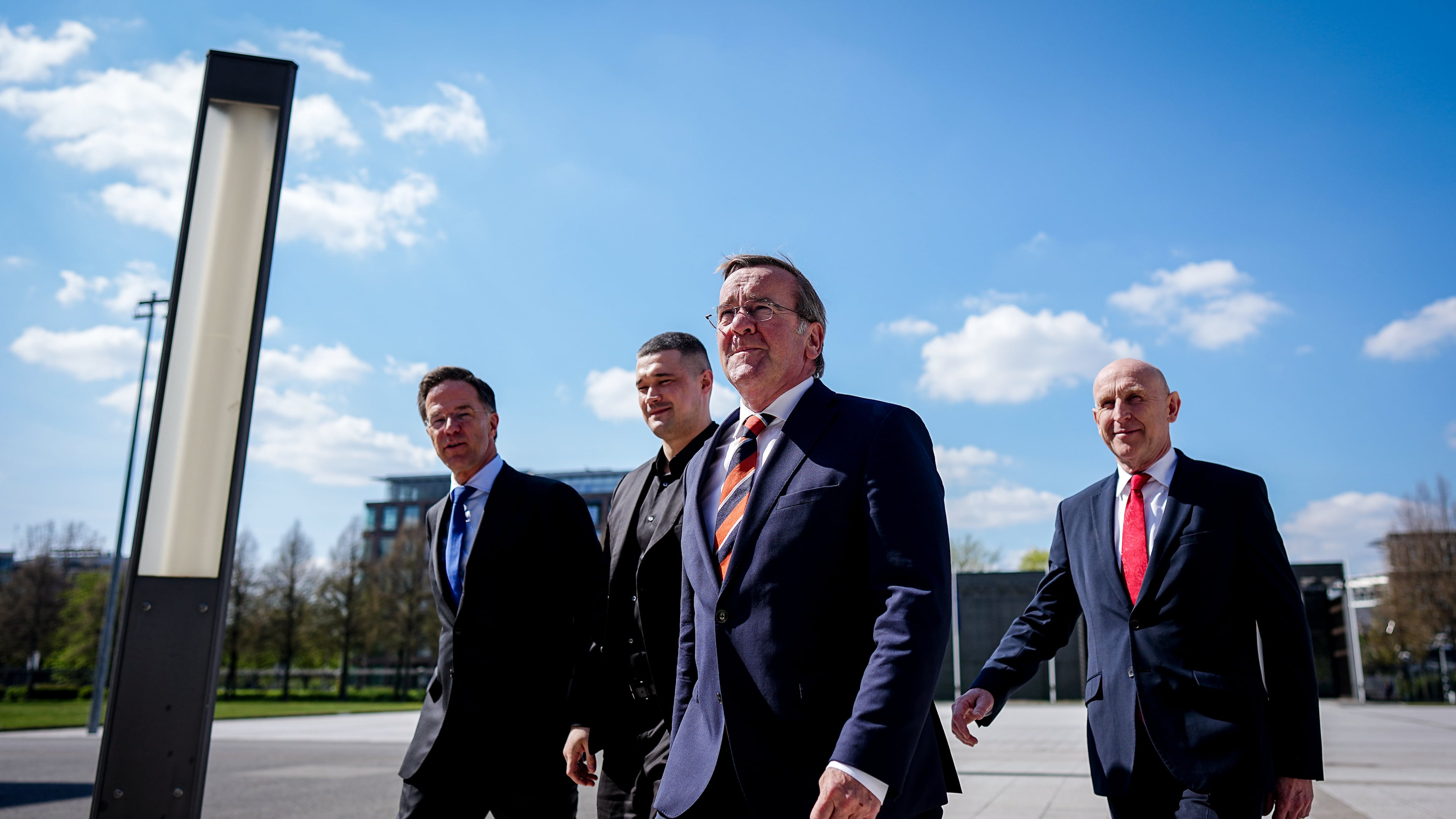 From left, Secretary General of NATO Mark Rutte, Ukraine's Minister of Defense Mykhailo Fedorov, Germany's Minister of Defense Boris Pistorius and Britain's Secretary of Defense John Healey meet at the Ukraine Contact Group meeting in front of the Federal Ministry of Defense in Berlin, Wednesday April 15, 2026. (Kay Nietfeld/dpa via AP)
