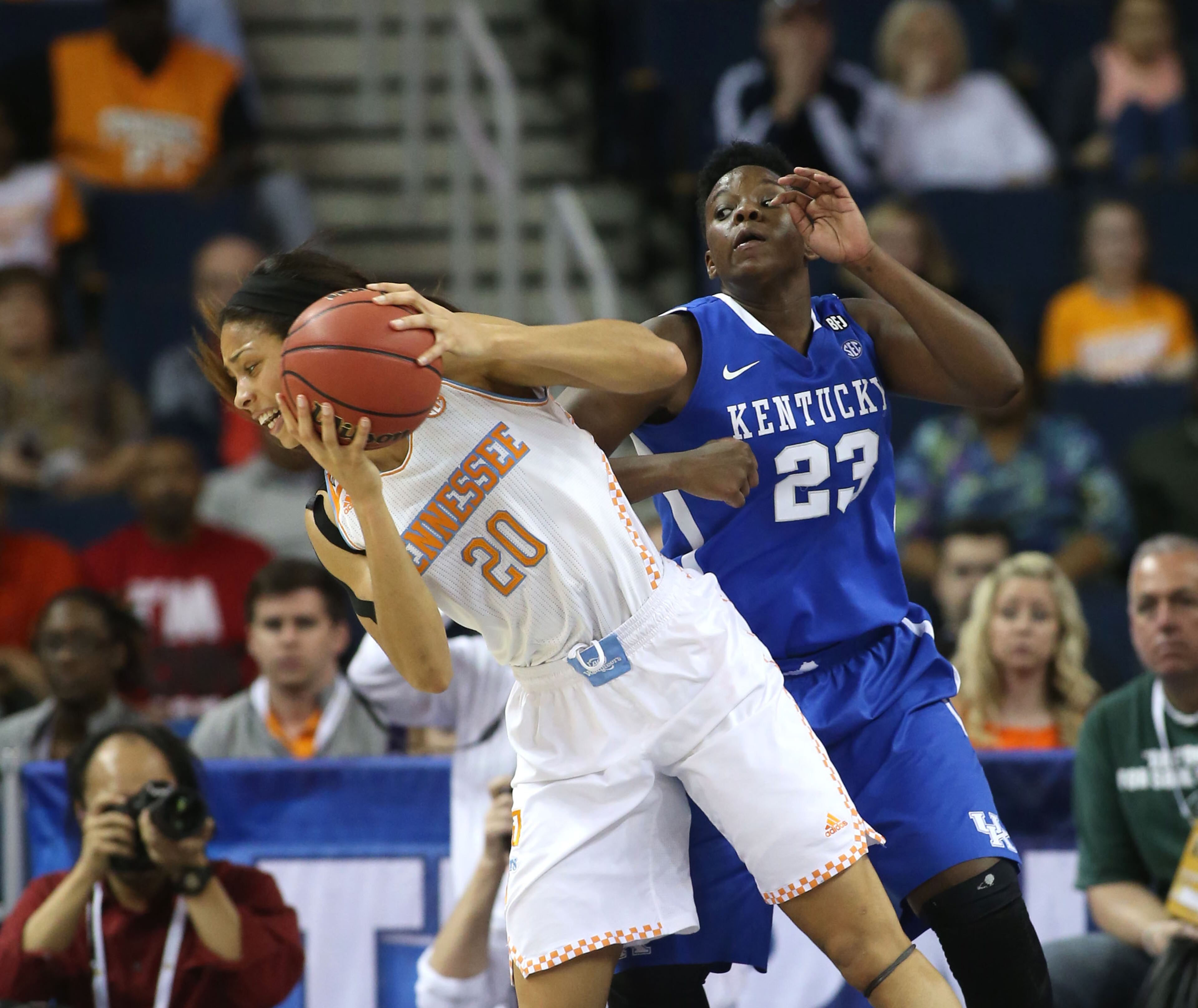 Tennessee center Isabelle Harrison (20) grabs a rebound against Kentucky forward/center Samarie Walker (23) in the second half of the finals of the Women's Southeastern Conference NCAA college basketball game, Sunday, March 9, 2014, in Duluth, Ga. Tennessee defeated Kentucky 71-70. (AP Photo/Jason Getz)