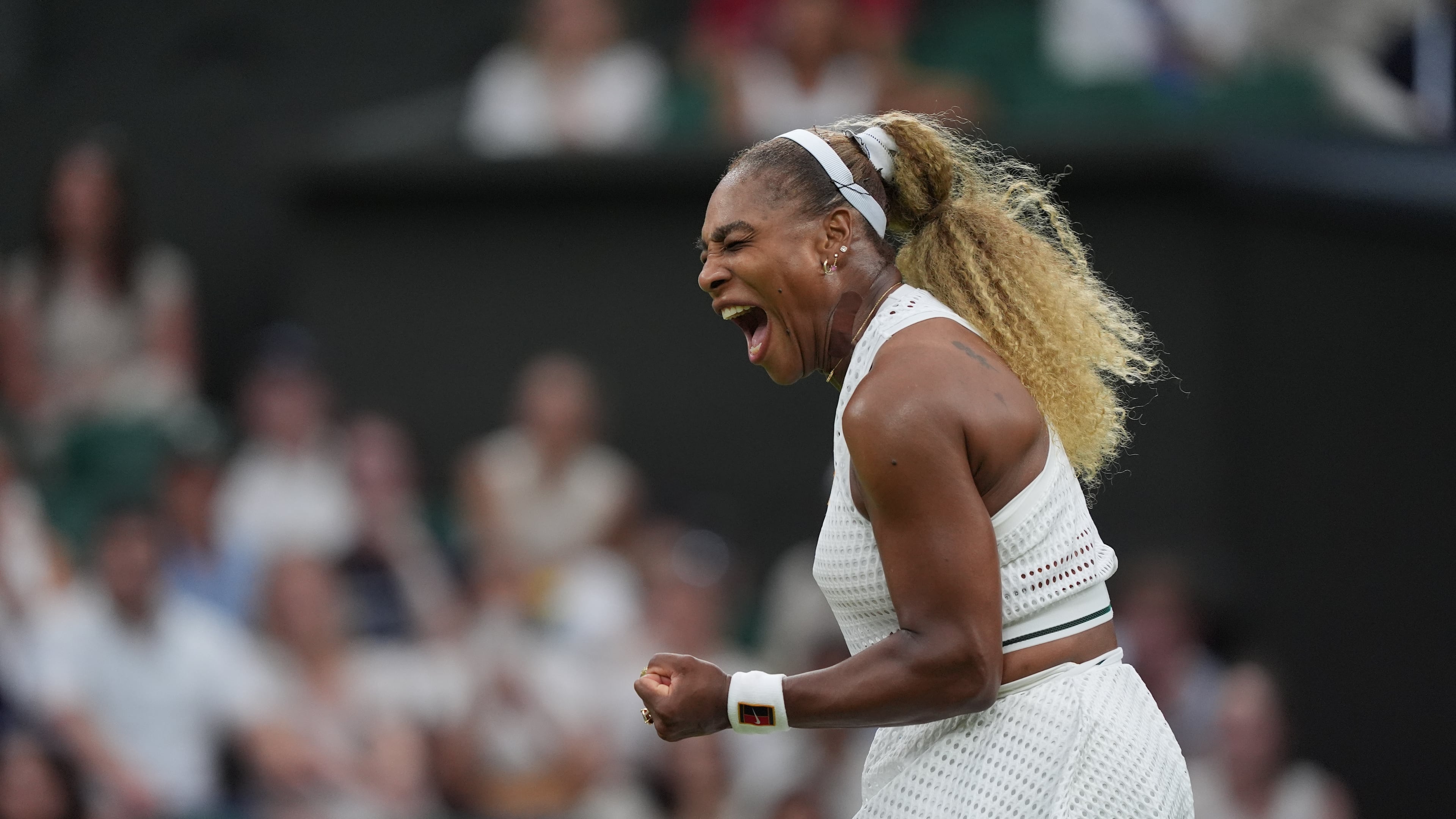 Serena Williams of the United States celebrates winning a point against Maya Joint of Australia in their first round women's singles match at the Wimbledon Tennis Championships in London, Tuesday, June 30, 2026. (AP Photo/Maja Smiejkowska)