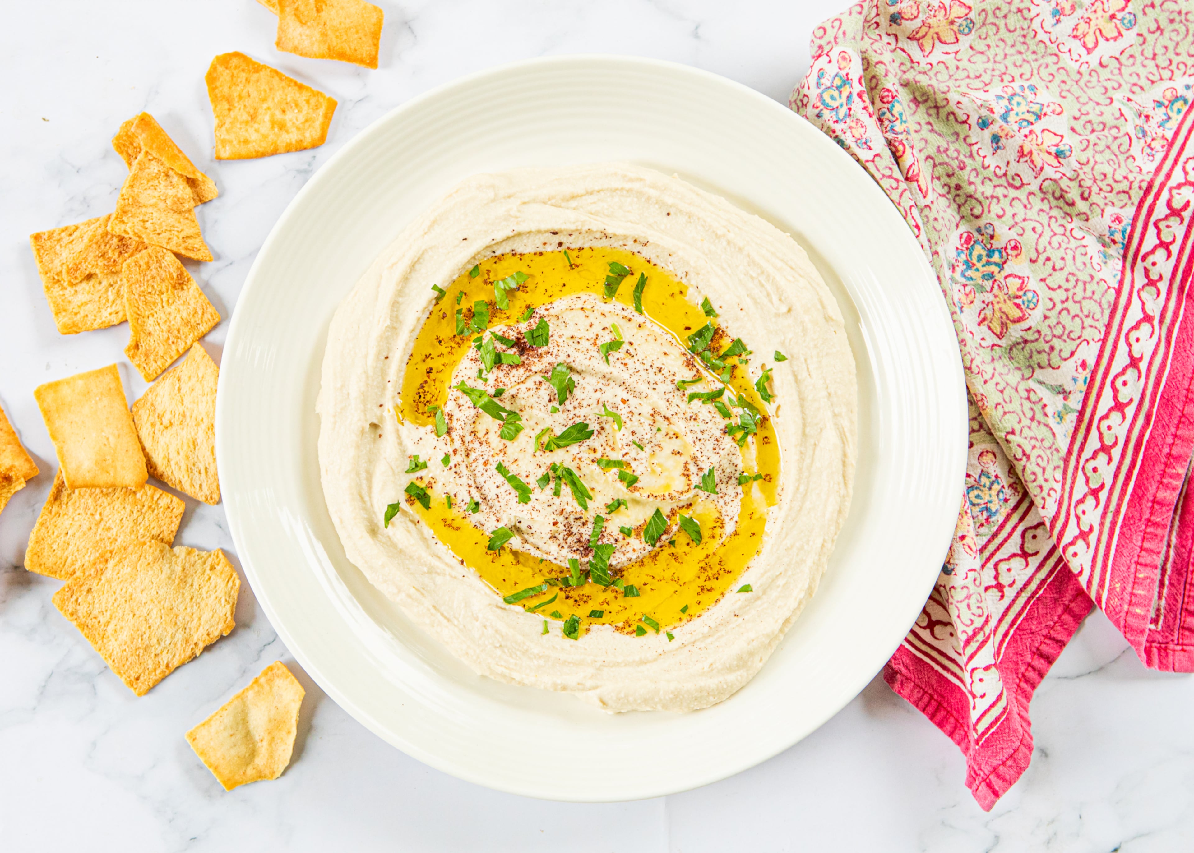 Dips like Any Bean Hummus whip beans into party-ready appetizers. (Aaliyah Man for the AJC/food styling by Kate Williams)