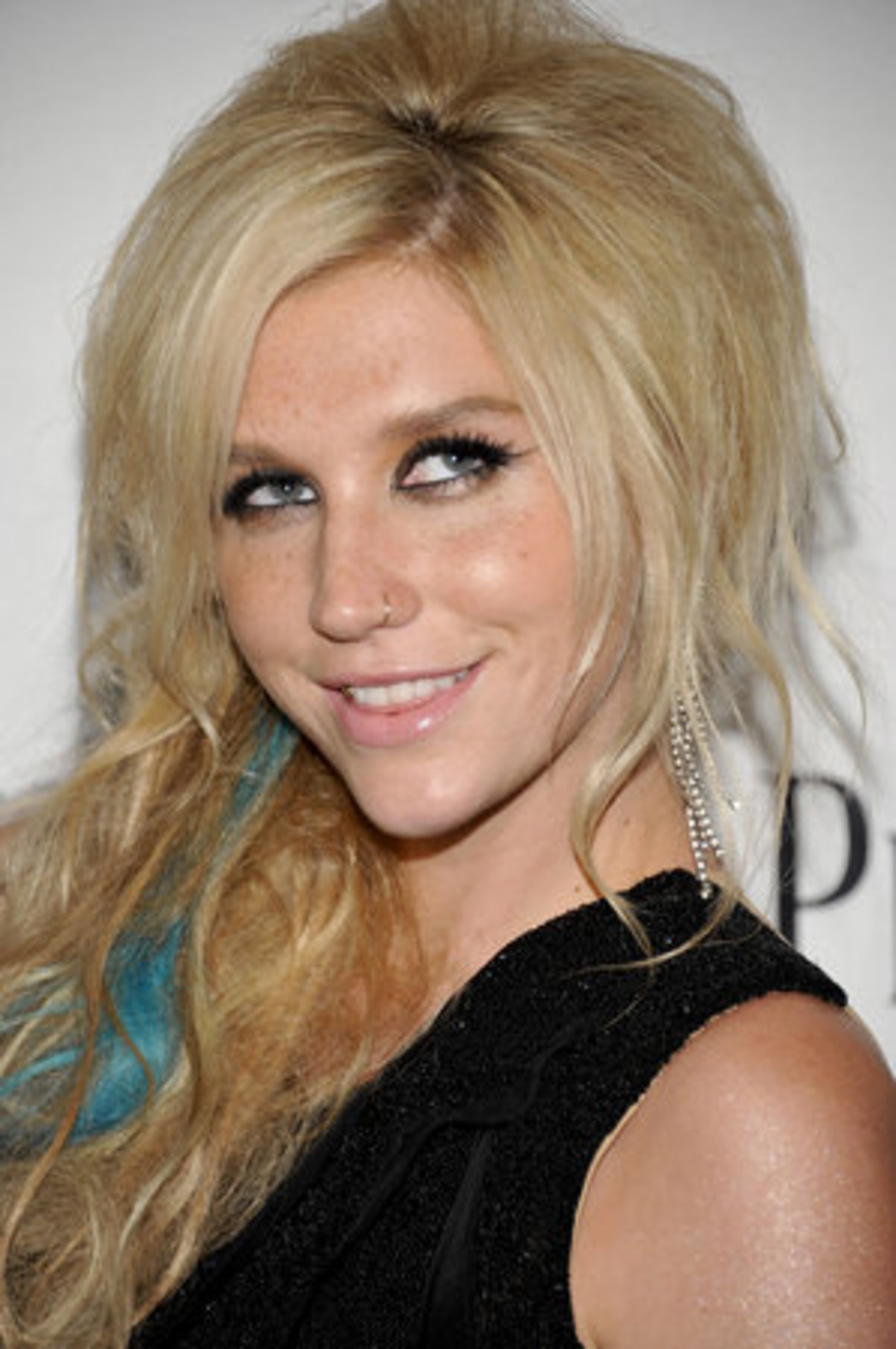 NOW WE KNOW WHAT KE$HA LOOKS LIKE WITHOUT A POUND OF GLITTER ON HER FACE: Singer Ke$ha attends amfAR New York's "Inspiration Gala" celebrating Men's Style at the Museum of Modern Art on Tuesday, June 14, 2011 in New York.