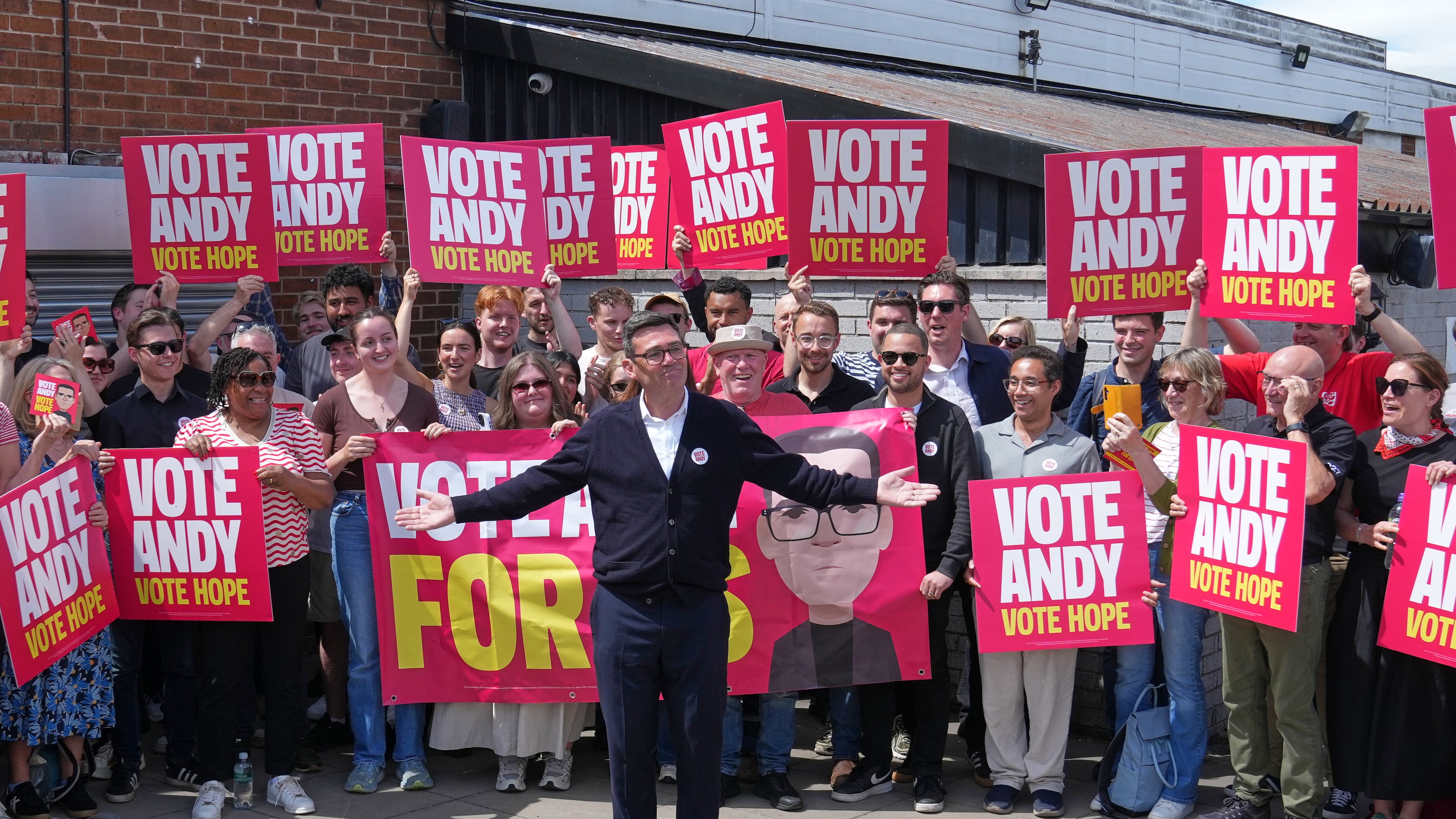 Britain's Labour candidate Andy Burnham stands in front of supporters during the by-election in Makerfield, England, Thursday, June 18, 2026 where voters are choosing a new lawmaker with Andy Burnham of the Labour Party as the leading contender.(AP Photo/Jon Super)