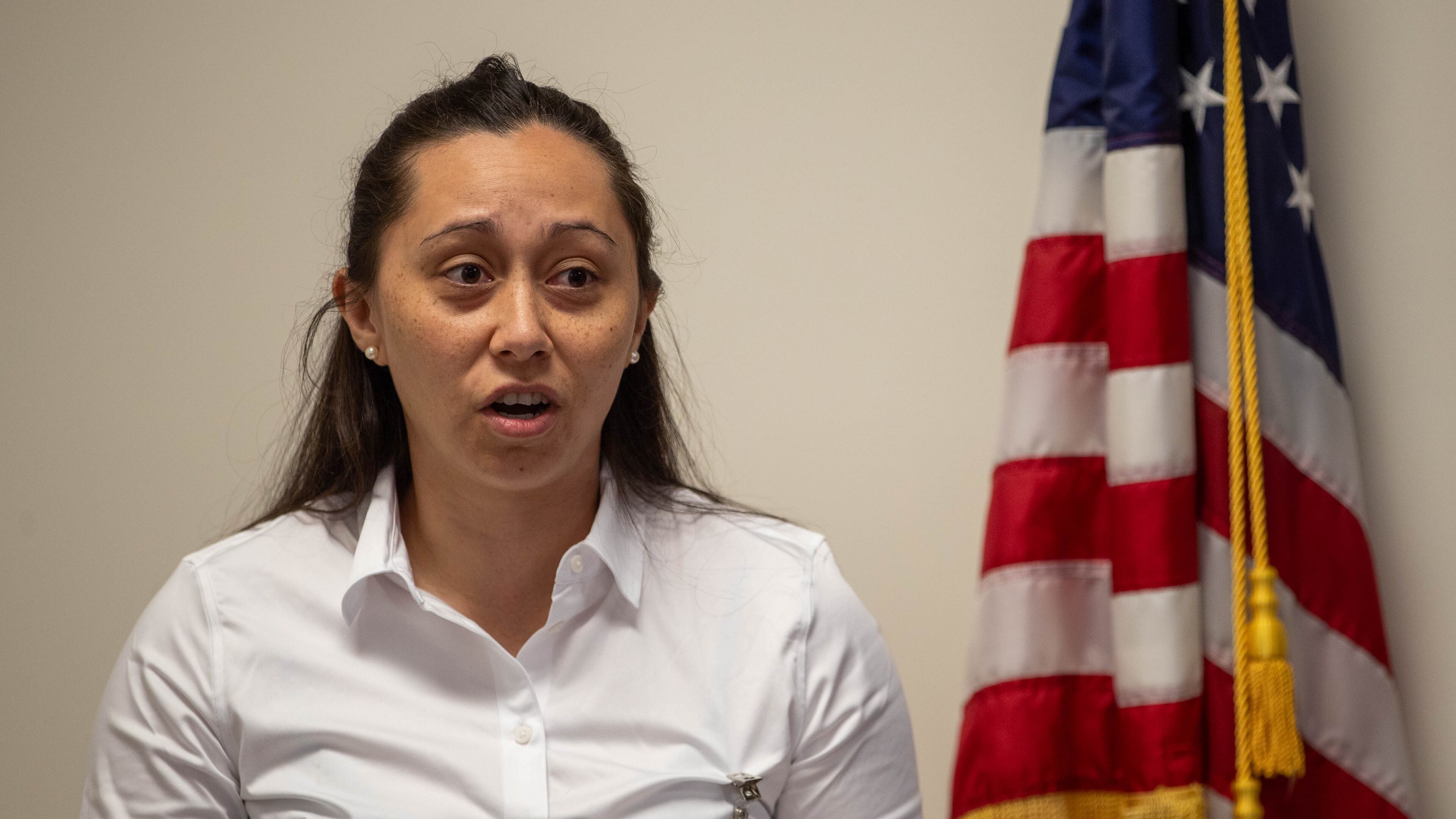 Mikayla Arciaga speaks at the Georgia Professional Standards Commission meeting on Thursday, July 13, 2023, to oppose ridding teacher preparation rules of words like “diversity” and “equity.” She works for the Intercultural Development Research Association, a nonprofit that aims to achieve equal educational opportunity. (Katelyn Myrick/katelyn.myrick@ajc.com)