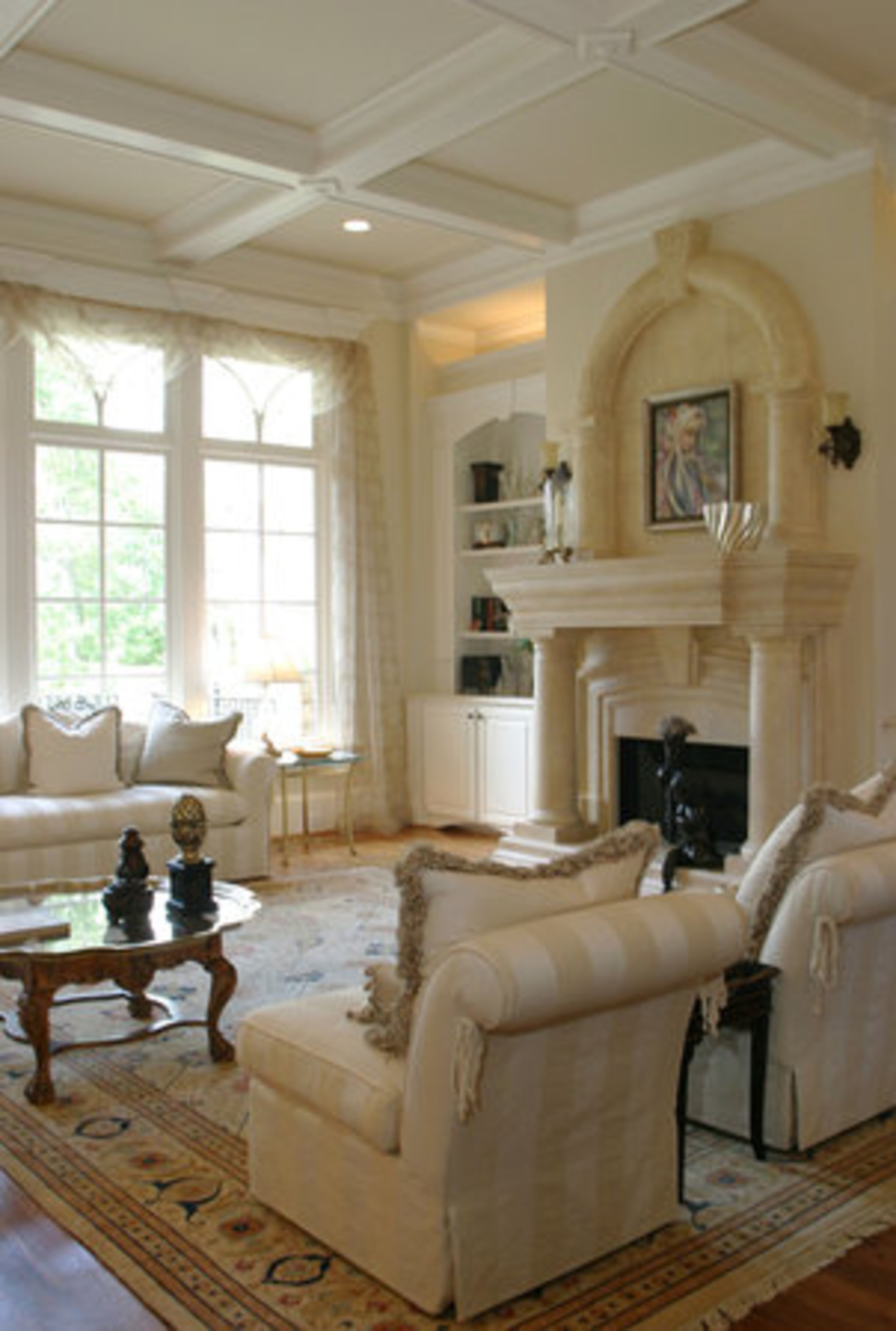 The great room is "very light with hints of apricot," notes Lois. "We like light colors, happy colors, versus serious colors," adds Tom.