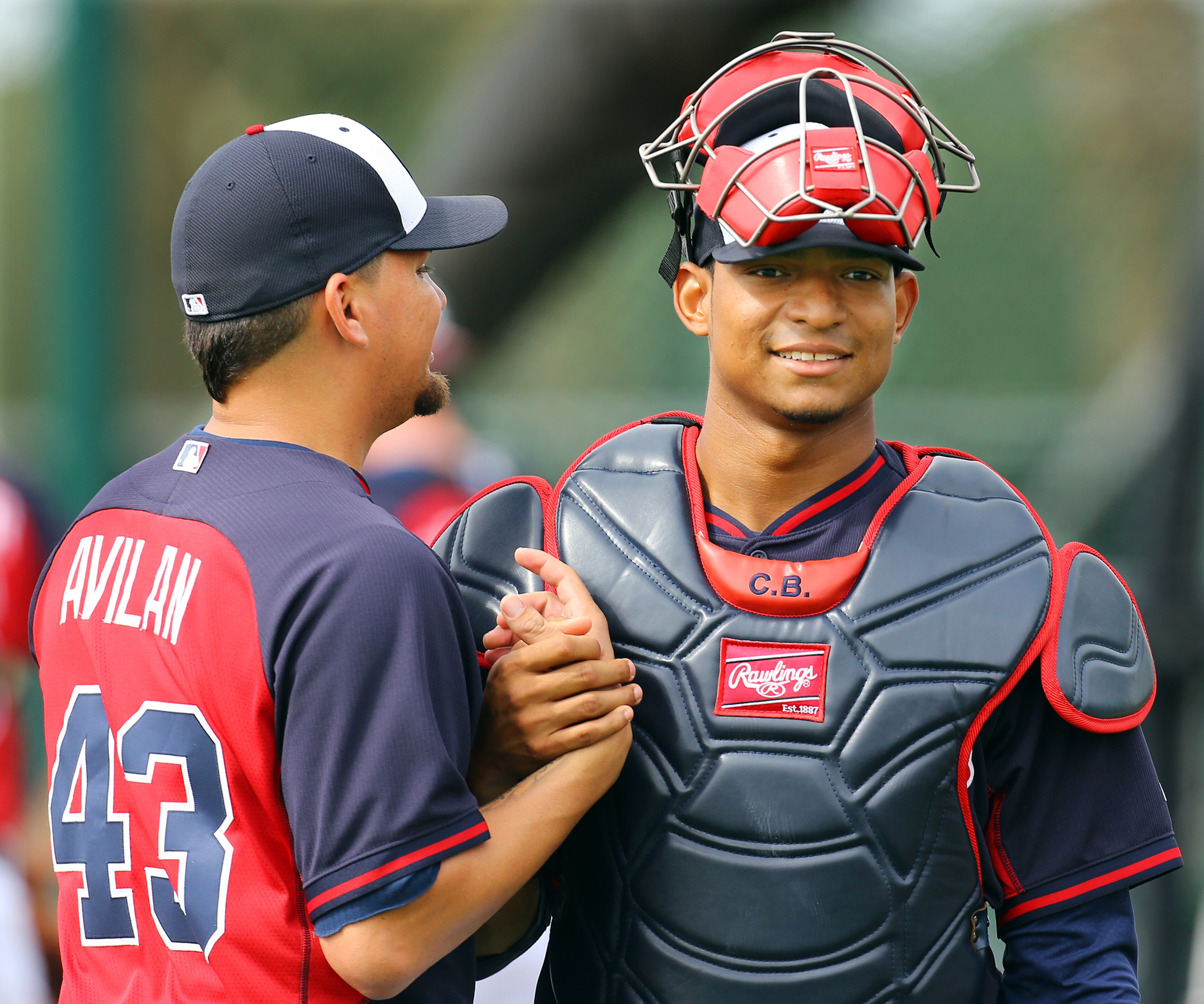Christian Bethancourt (right) and pitcher Luis Avilan get together at spring training.