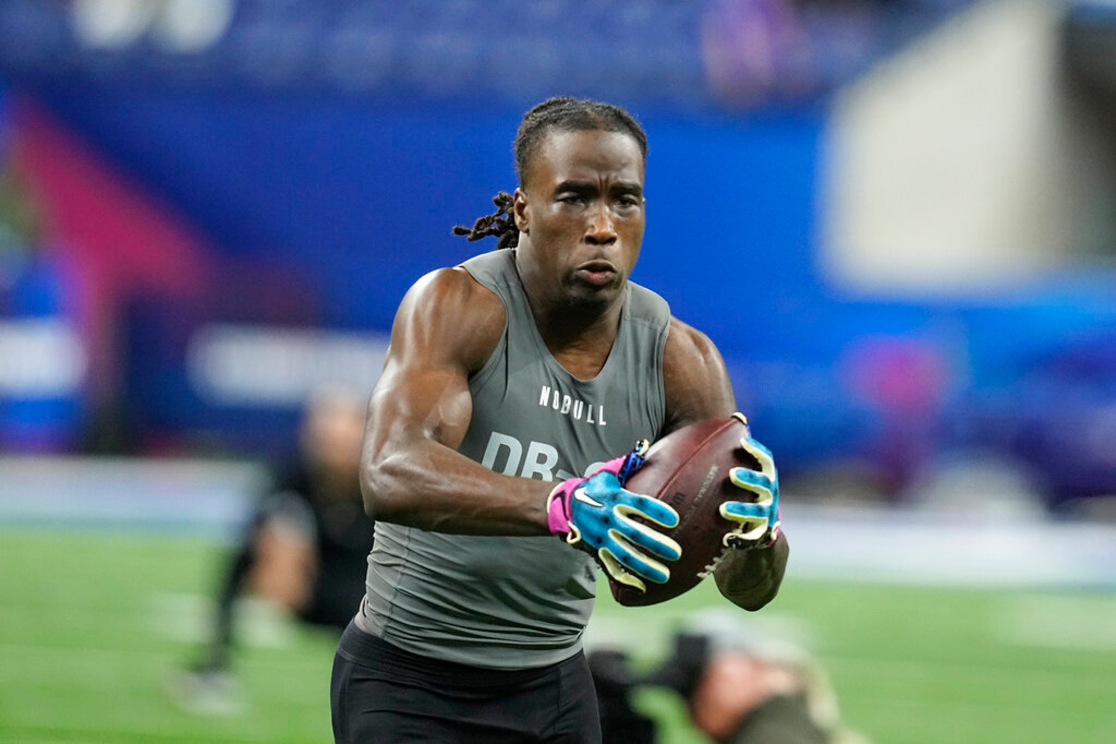 Georgia defensive back Kelee Ringo runs a drill at the NFL football scouting combine in Indianapolis, Friday, March 3, 2023. (AP Photo/Darron Cummings)