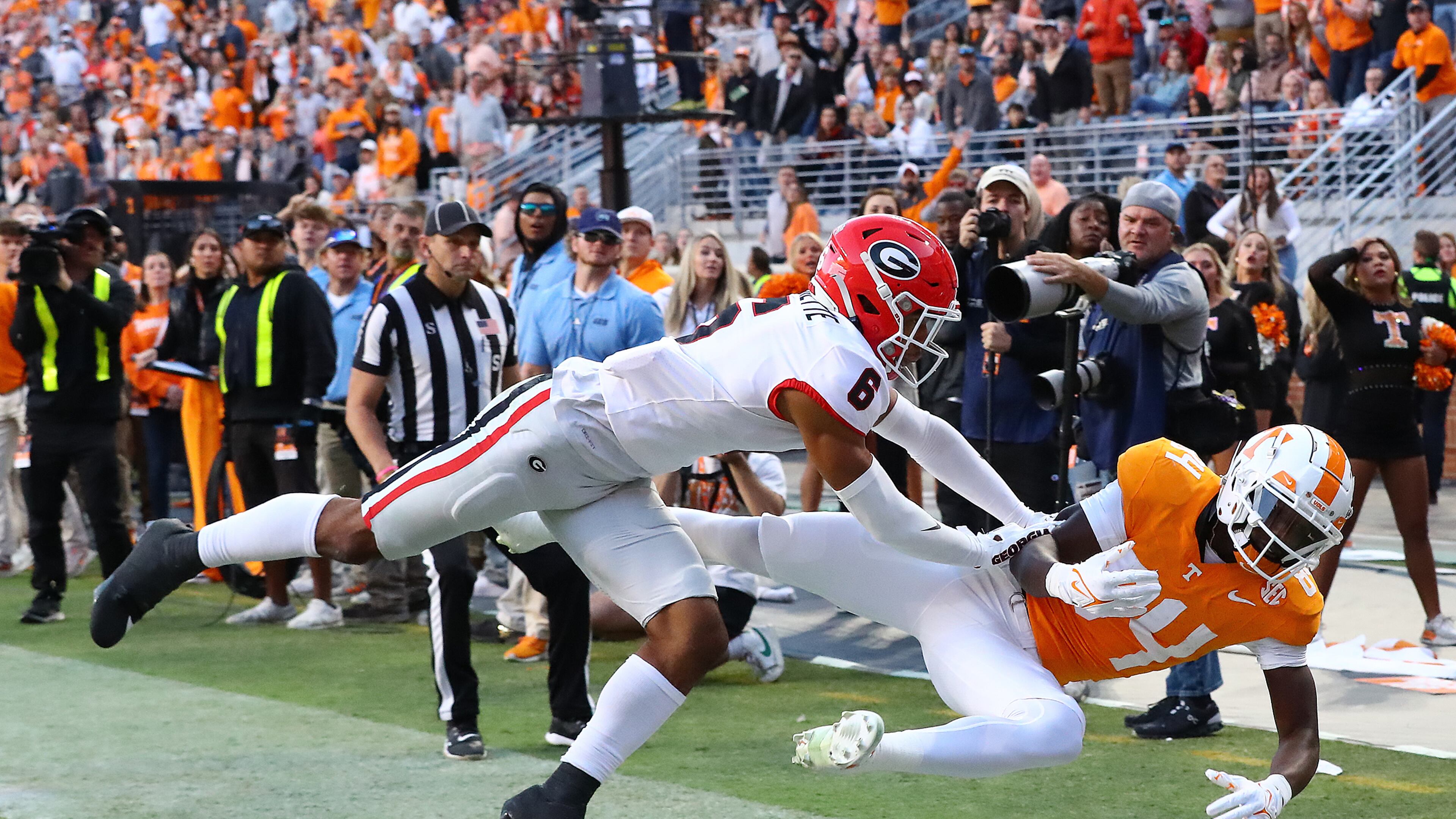 Georgia defensive back Daylen Everette breaks up a pass attempt in the endzone to Tennessee wide receiver Kaleb Webb during the second quarter in an NCAA college football game on Saturday, Nov. 18, 2023, in Knoxville. (Curtis Compton for the AJC)