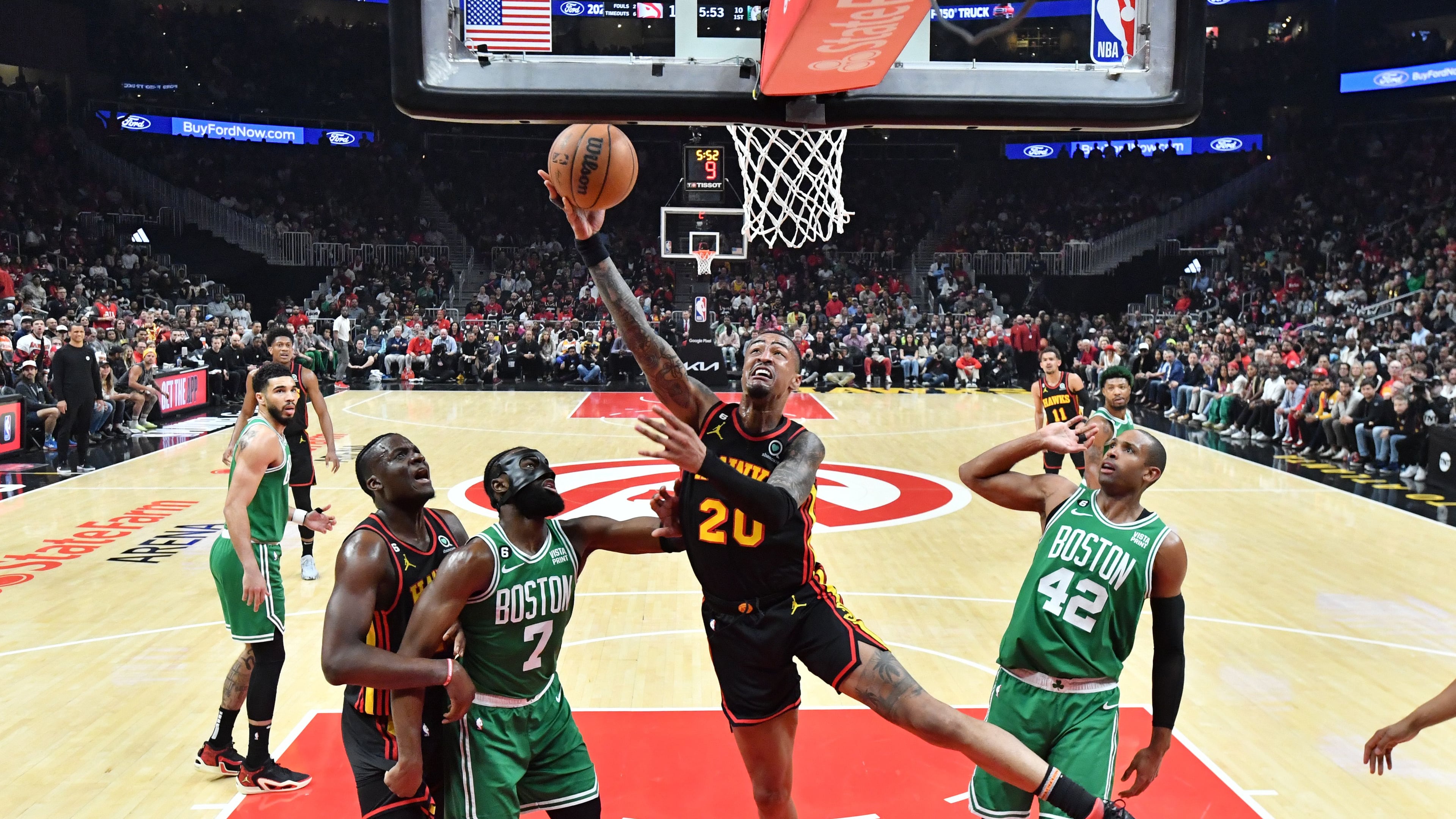 Atlanta Hawks' forward John Collins (20) shoots the ball against the Boston Celtics during the first half in Game 6 of the first round of the Eastern Conference playoffs at State Farm Arena on April 27, 2023, in Atlanta. (Hyosub Shin/The Atlanta Journal-Constitution)