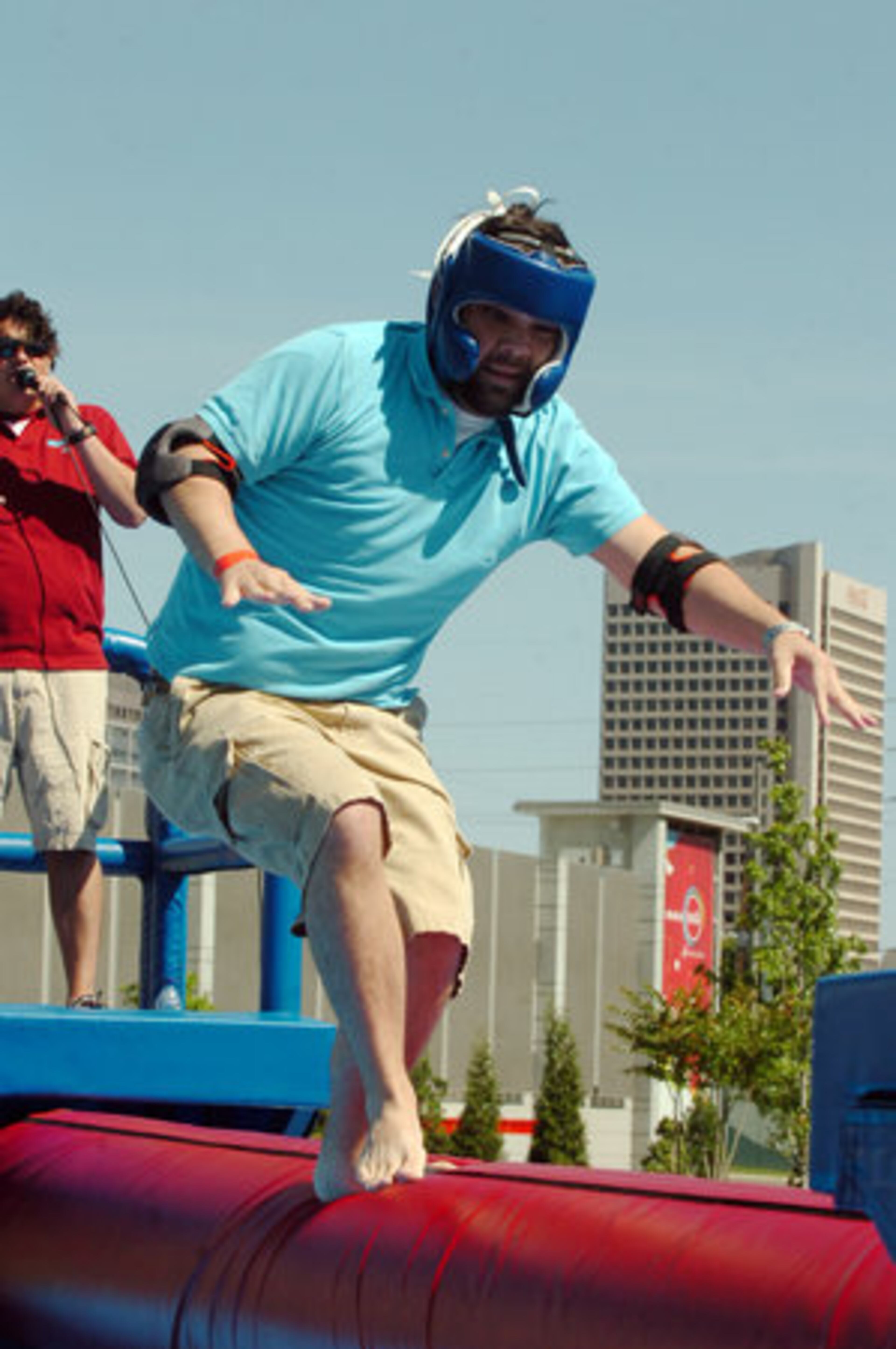 T. J. Ellis of Rock Hill, S.C., struggles to keep his balance on the log roll.