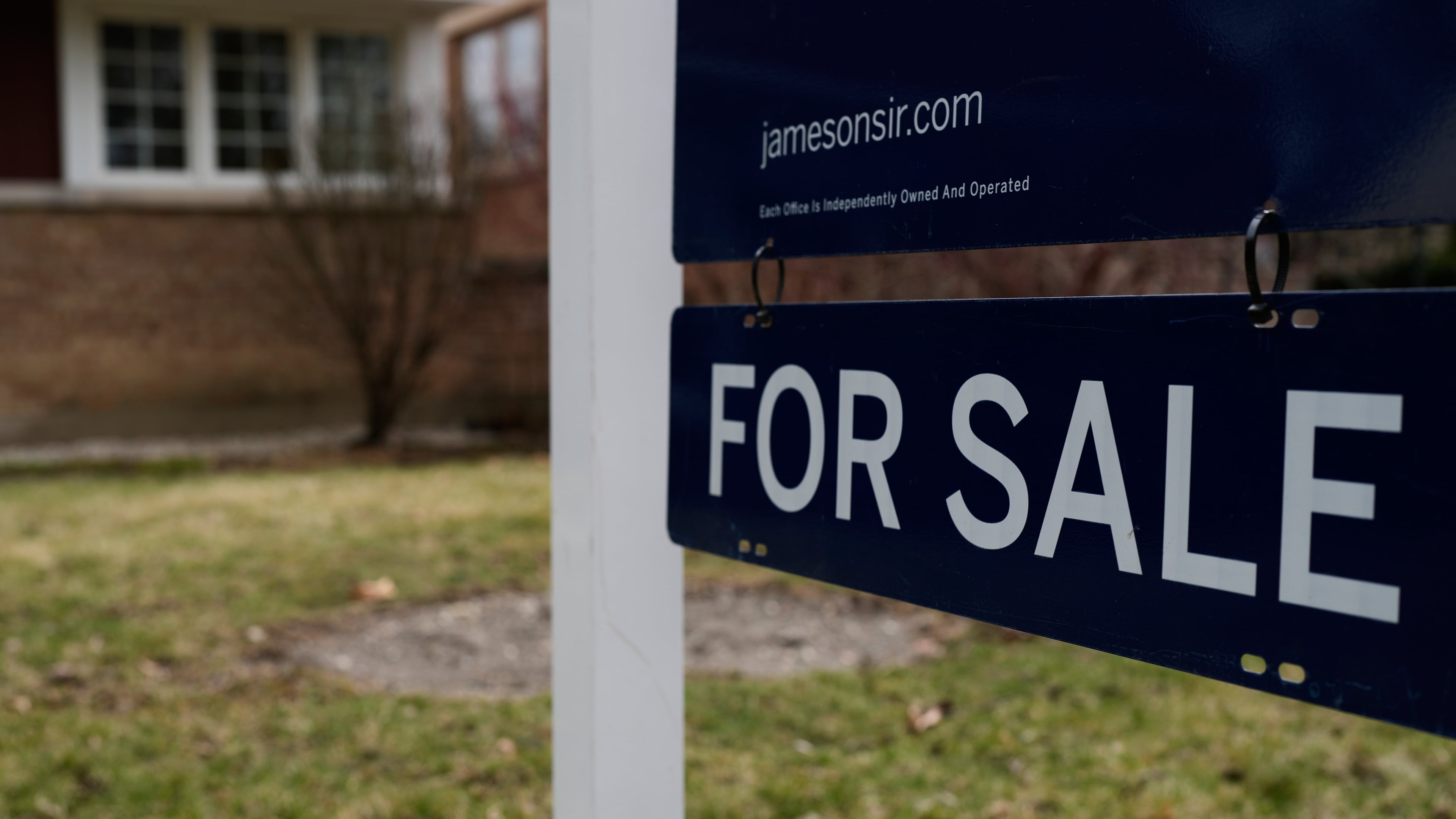 A House For Sale sign is displayed in front of a home in Evanston, Ill.,Wednesday, March 25, 2026. (AP Photo/Nam Y. Huh)