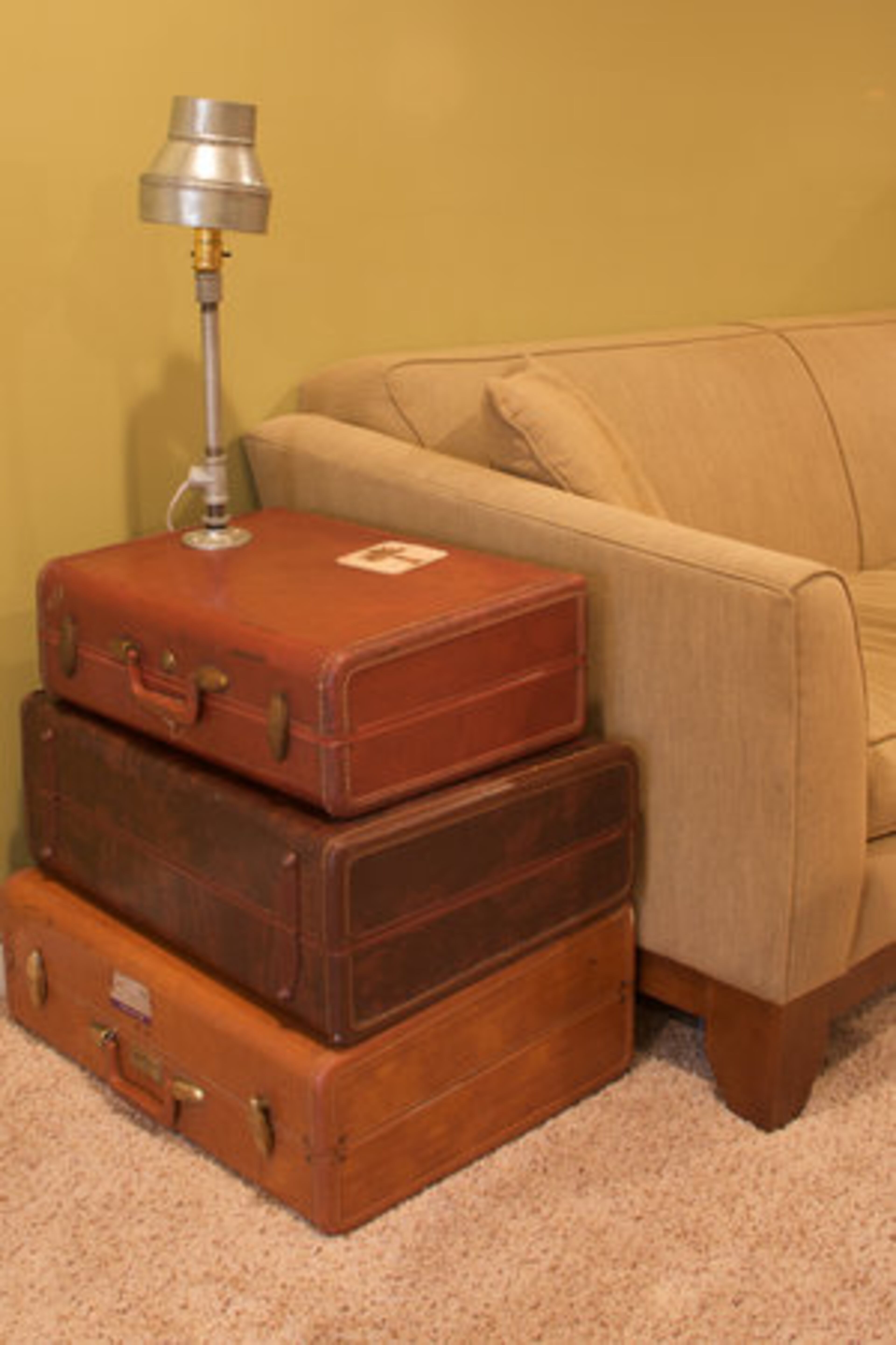 Murray and Michelle Shevlin came up with the idea to create an antique suitcase end table. One of the suitcases belonged to Murray's father.