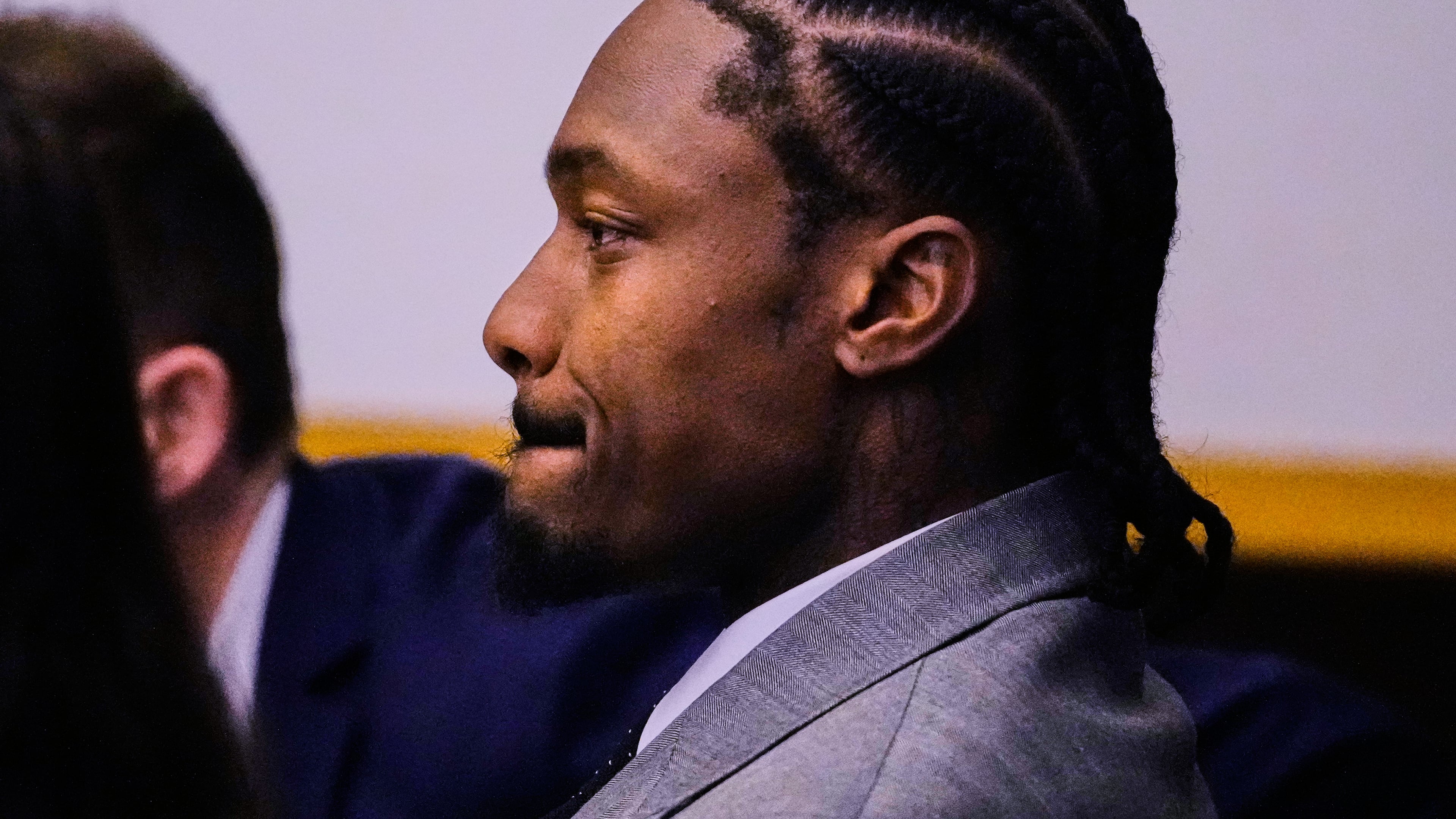 Former New England Patriots wide receiver Stefon Diggs reacts after a not guilty verdict at his trial at Norfolk County District Court, Tuesday, May 5, 2026, in Dedham, Mass. (AP Photo/Charles Krupa, Pool)