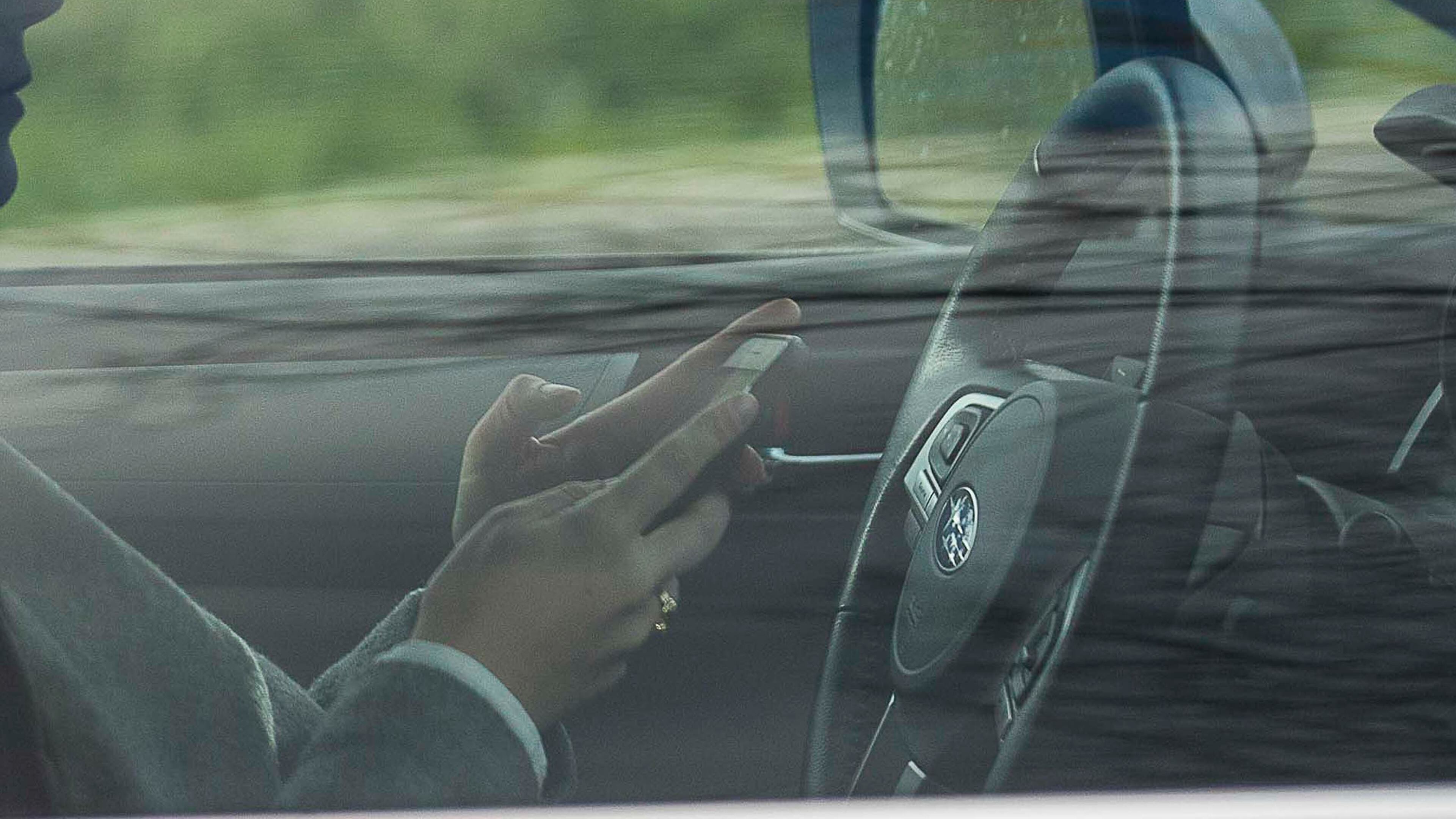 The Georgia State Patrol has issued nearly 50,000 citations since the Hands-Free Georgia Act took effect two years ago. (ALYSSA POINTER/ALYSSA.POINTER@AJC.COM)