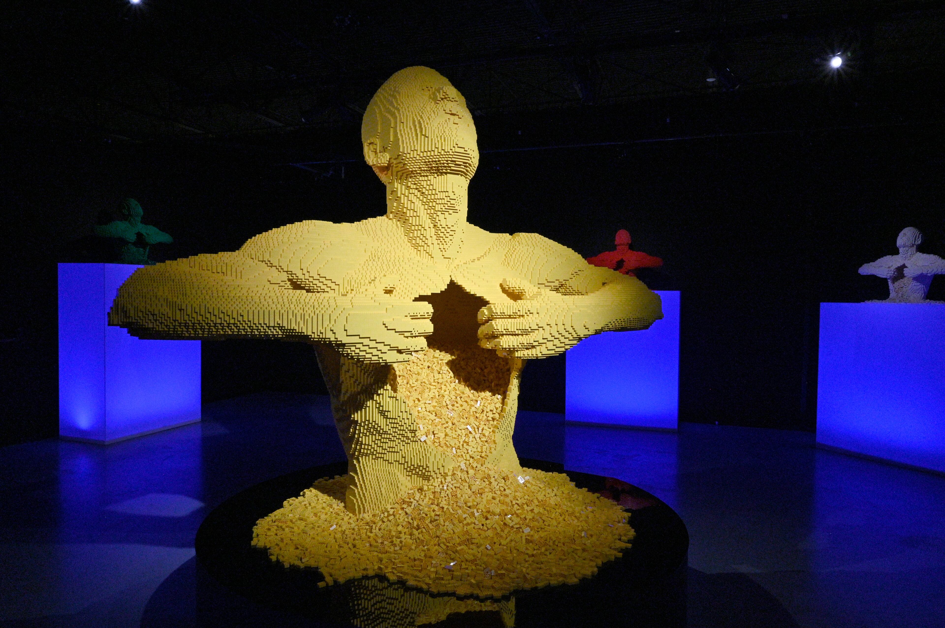 “Big Yellow” made made with 74,596 Lego bricks at "Art of the Brick Immersive Experience" exhibition at Exhibition Hub Atlanta Art Centre, Wednesday, April 19, 2023, in Doraville. The exhibition will feature many pieces and themes, including a room with oversized sculptures (25-foot long), over 70 works of art crafted from more than 1 million LEGO bricks, galleries celebrating human-kind and nature, and a short documentary about how Nathan creates his works. (Hyosub Shin / Hyosub.Shin@ajc.com)