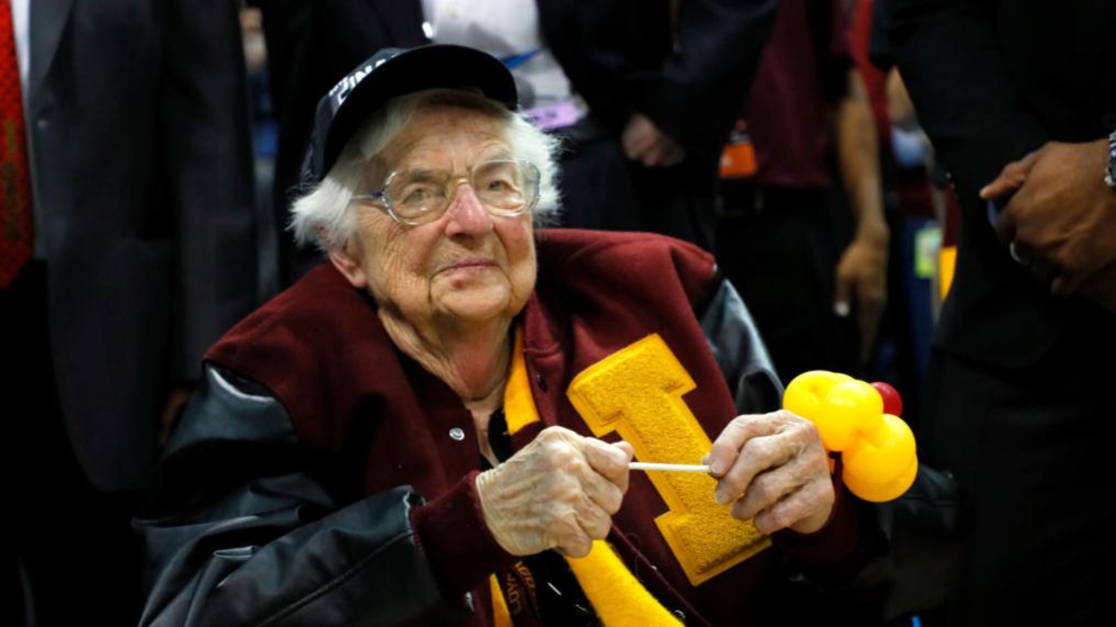 Sister Jean Dolores Schmidt celebrates with the Loyola Ramblers after the team defeated the Kansas State on Saturday in Atlanta.