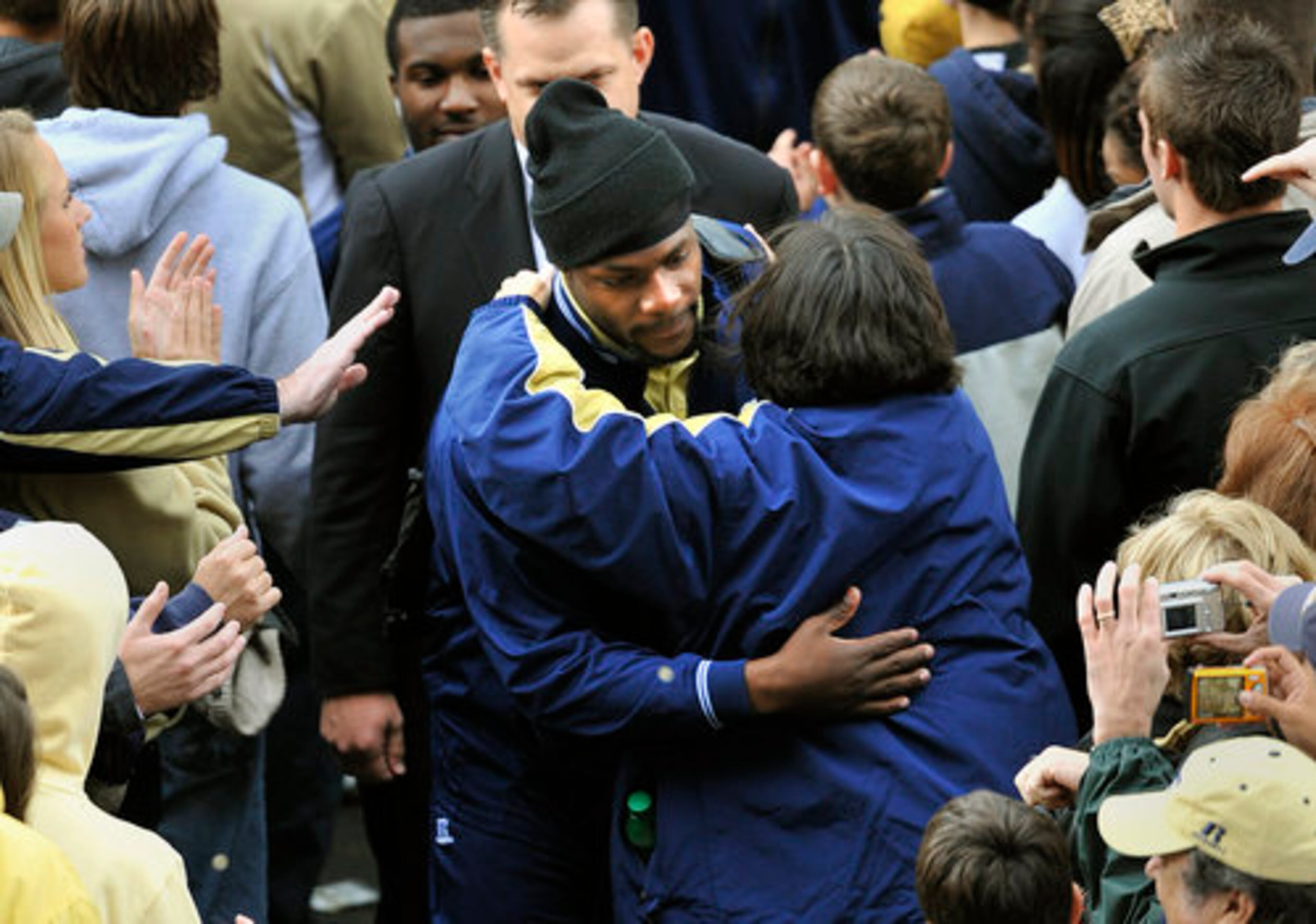 Quarterback Josh Nesbitt received a hug from a fan.