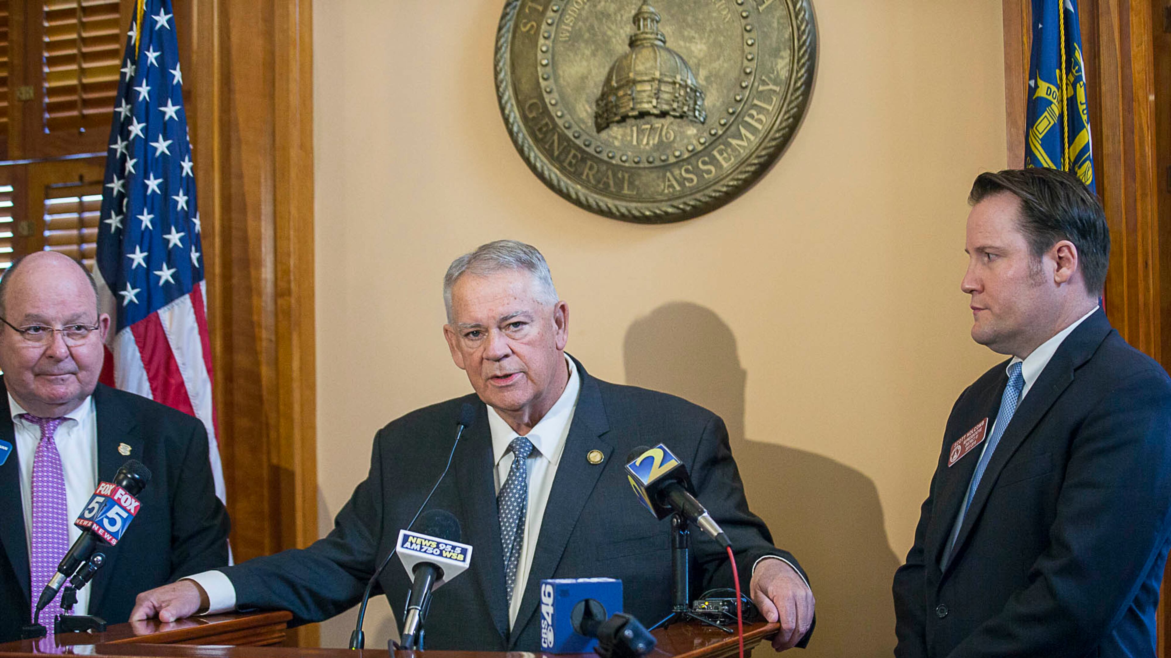 Georgia Speaker of the House David Ralston, center, stands with state Rep. Scott Holcomb, right, and Vernon Keenan, then the director of the Georgia Bureau of Investigation, during a press conference about the processing of rape kits and subsequent additional budget funding. (ALYSSA POINTER/ALYSSA.POINTER@AJC.COM)