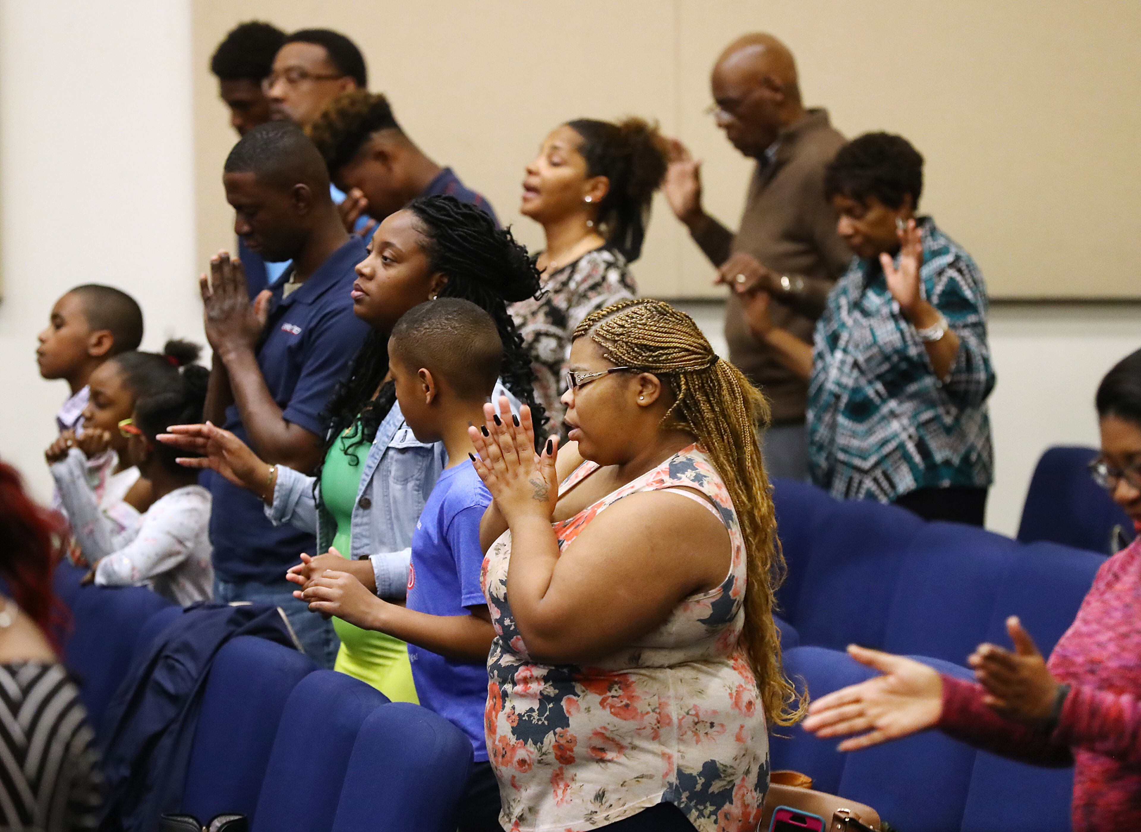 March 15, 2020 Austell: Several hundred members attend worship service while Pastor Wilbur Purvis III preaches on the coronavirus saying âdonât let coronavirus steal your praiseâ at Destiny World Church on Sunday, March 15, 2020, in Austell. The congregation took a special offering to adopt a local apartment complex to supply lunch to needy school children the next two weeks. Curtis Compton ccompton@ajc.com