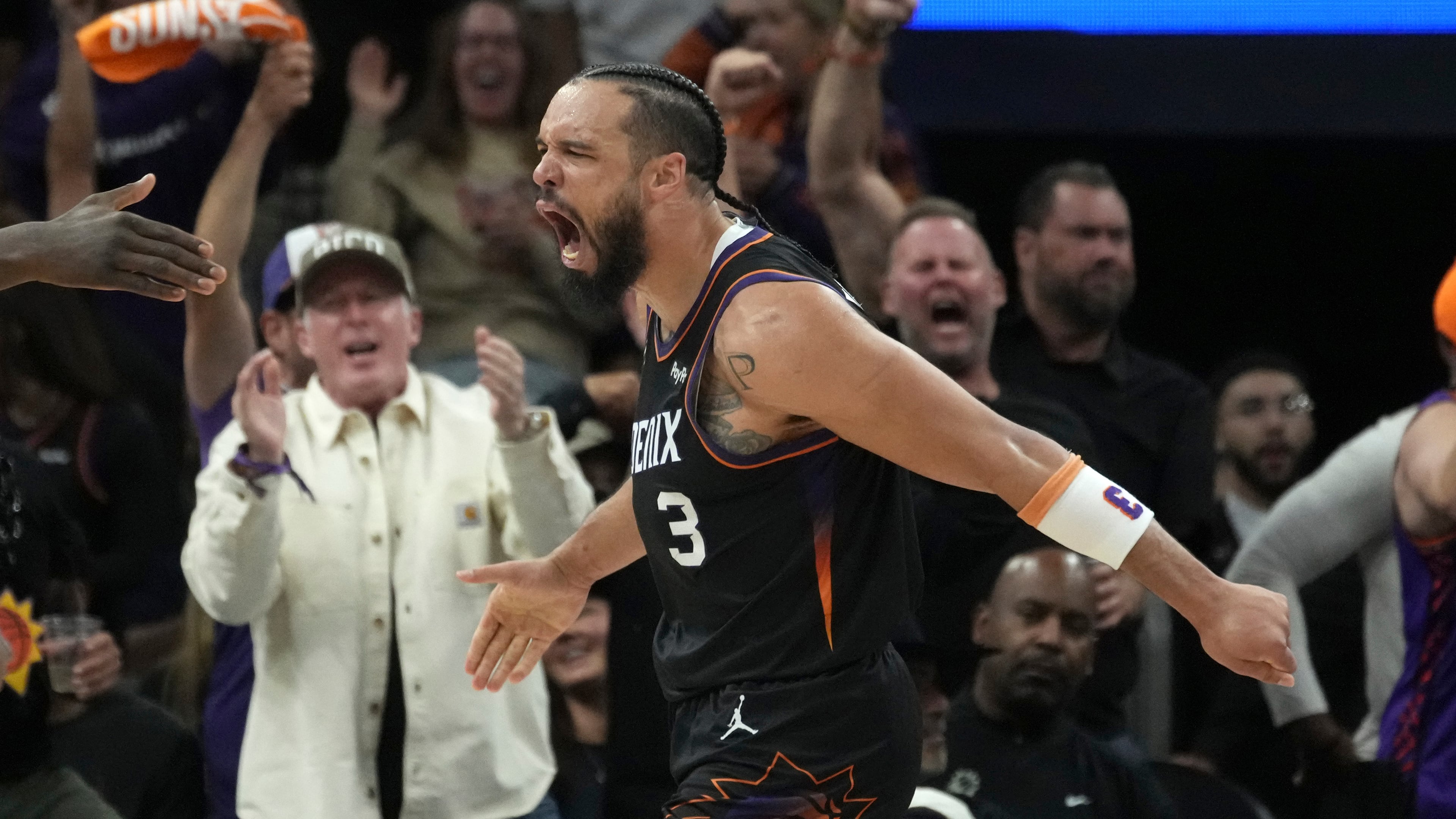 FILE - Phoenix Suns forward Dillon Brooks celebrates his score and being fouled during the second half of Game 4 in a first-round NBA playoffs basketball series against the Oklahoma City Thunder, Monday, April 27, 2026, in Phoenix. (AP Photo/Ross D. Franklin,File)