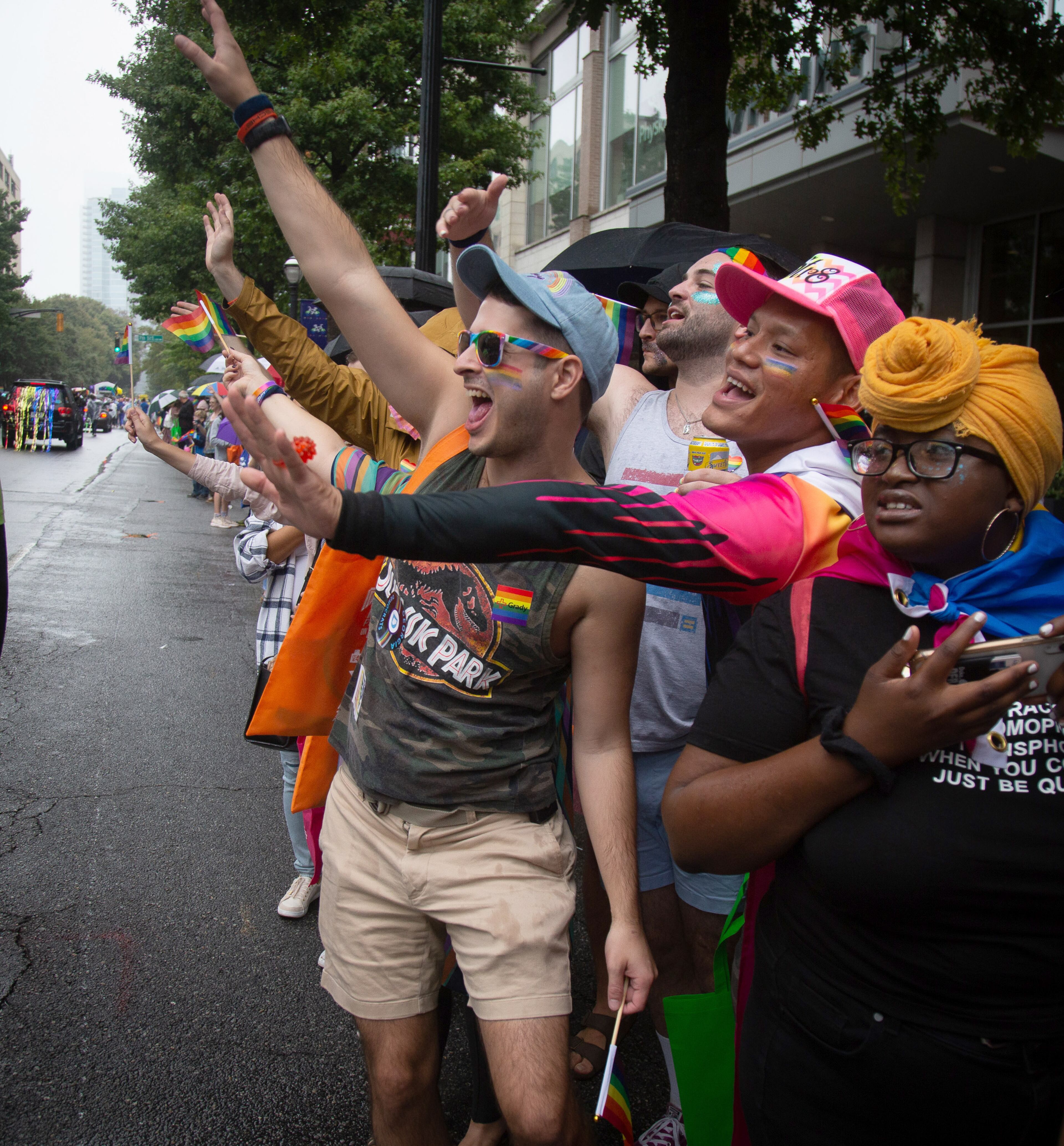 The crowd cheers the parade as it heads down Peachtree Street during the 49th annual Pride Festival and Parade in Atlanta on Sunday, Oct. 13, 2019. STEVE SCHAEFER / SPECIAL TO THE AJC