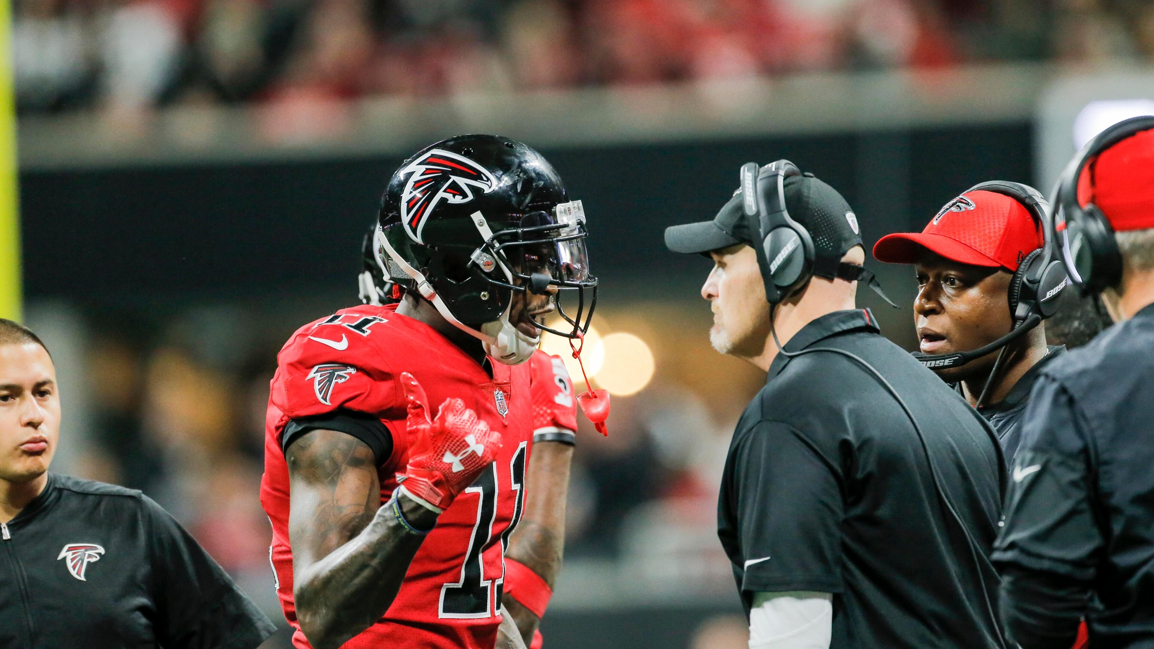 12/07/2017 -- Atlanta, GA, - Atlanta Falcons head coach Dan Quinn talks with Atlanta Falcons wide receiver Julio Jones (11) during the second half of a game against the New Orleans Saints at Mercedes-Benz Stadium, Thursday, December 7, 2017. The Falcons beat the Saints, 20-7. ALYSSA POINTER/ALYSSA.POINTER@AJC.COM