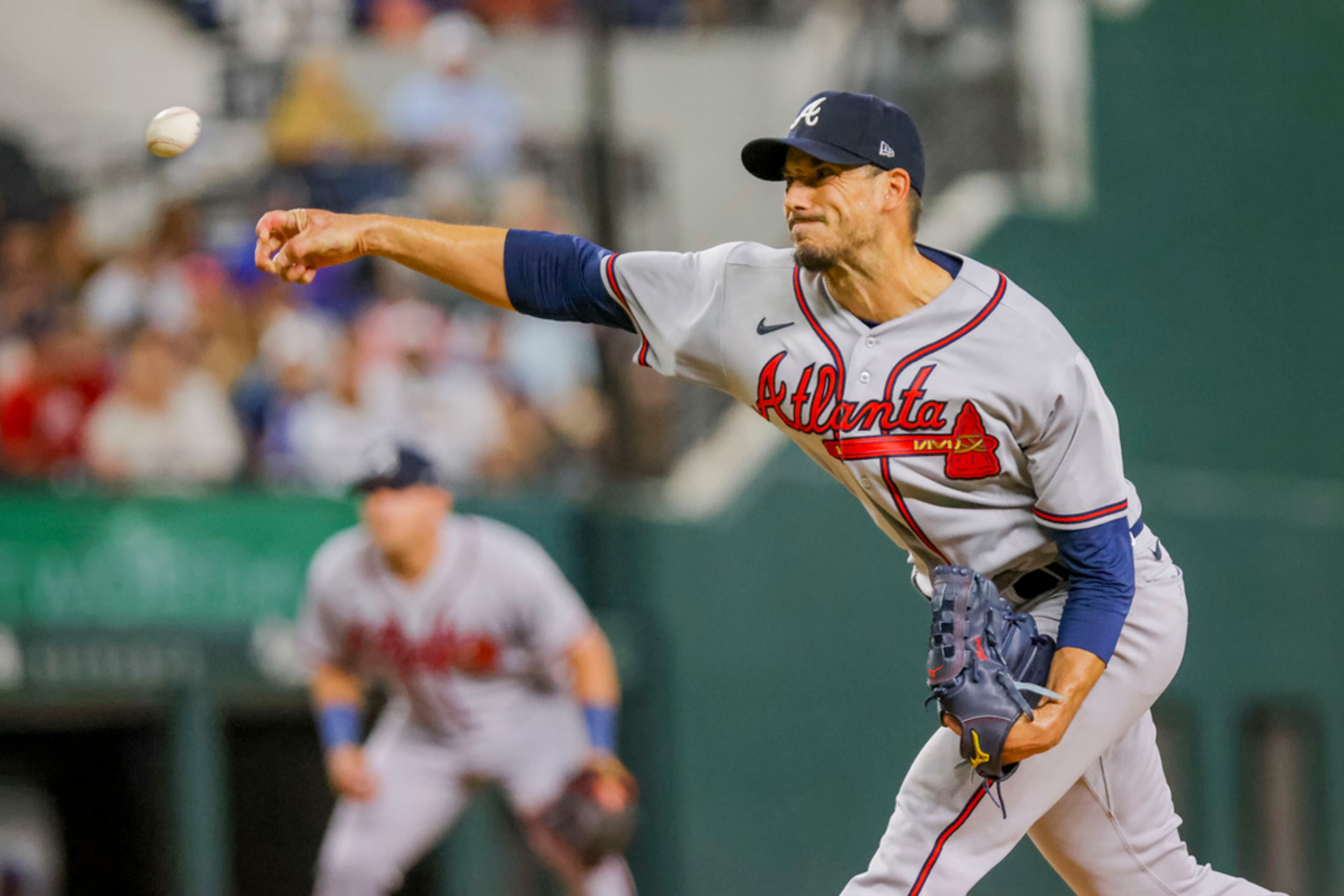 Atlanta Braves pitcher Charlie Morton delivers during the bottom of the second inning of a baseball game against the Texas Rangers in Arlington, Texas, Monday, May 15, 2023. (AP Photo/Gareth Patterson)
