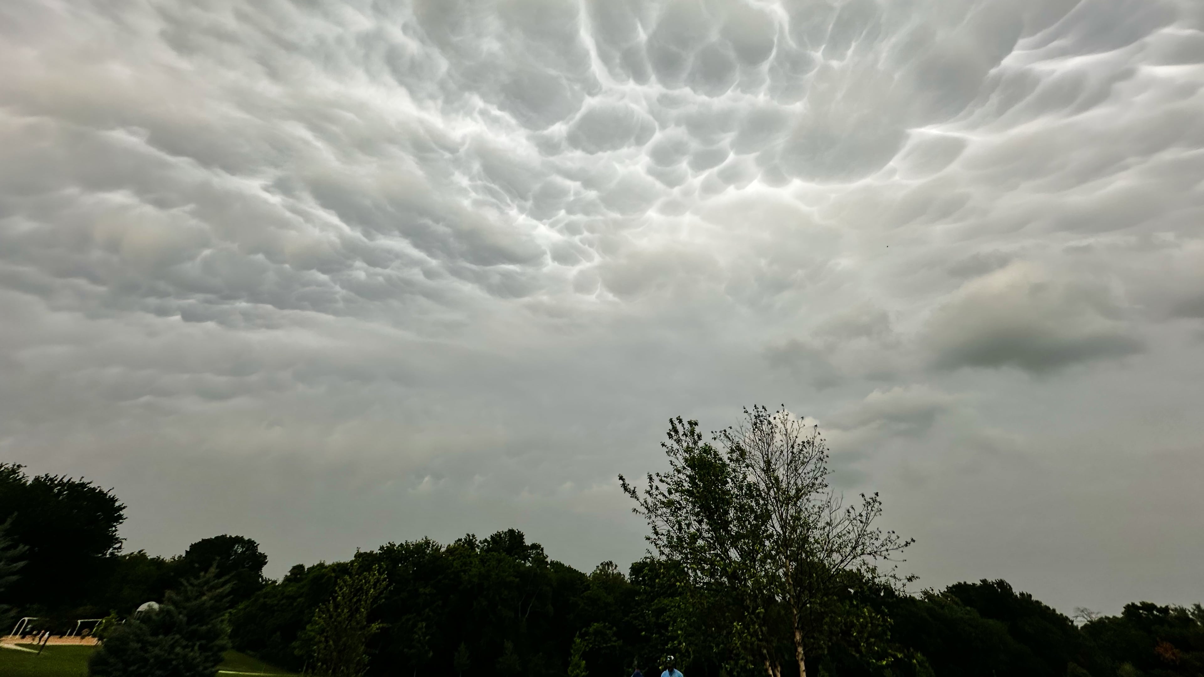 Storm clouds form over a public park as thunderstorms approaches the region, Saturday, April 25, 2026, in Plano, Texas. (AP Photo/Tony Gutierrez)
