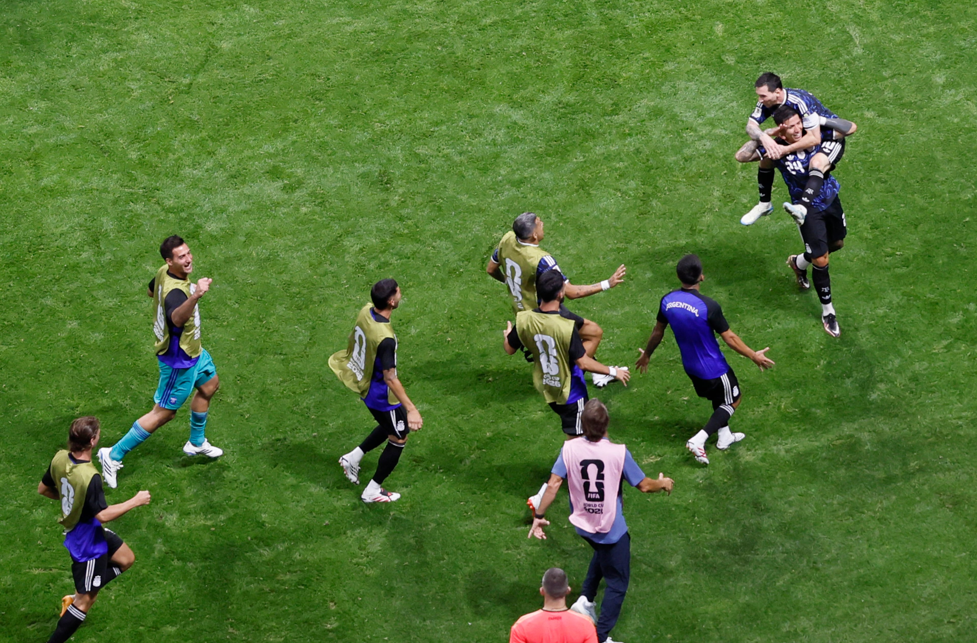 Argentina's Lionel Messi rides the back of teammate Argentina's Enzo Fernandez after he scored the tying goal against England in FIFA World Cup Semifinal match at Atlanta Stadium (Mercedes-Benz Stadium) on Wednesday, July 15, 2026. (Miguel Martinez/AJC)