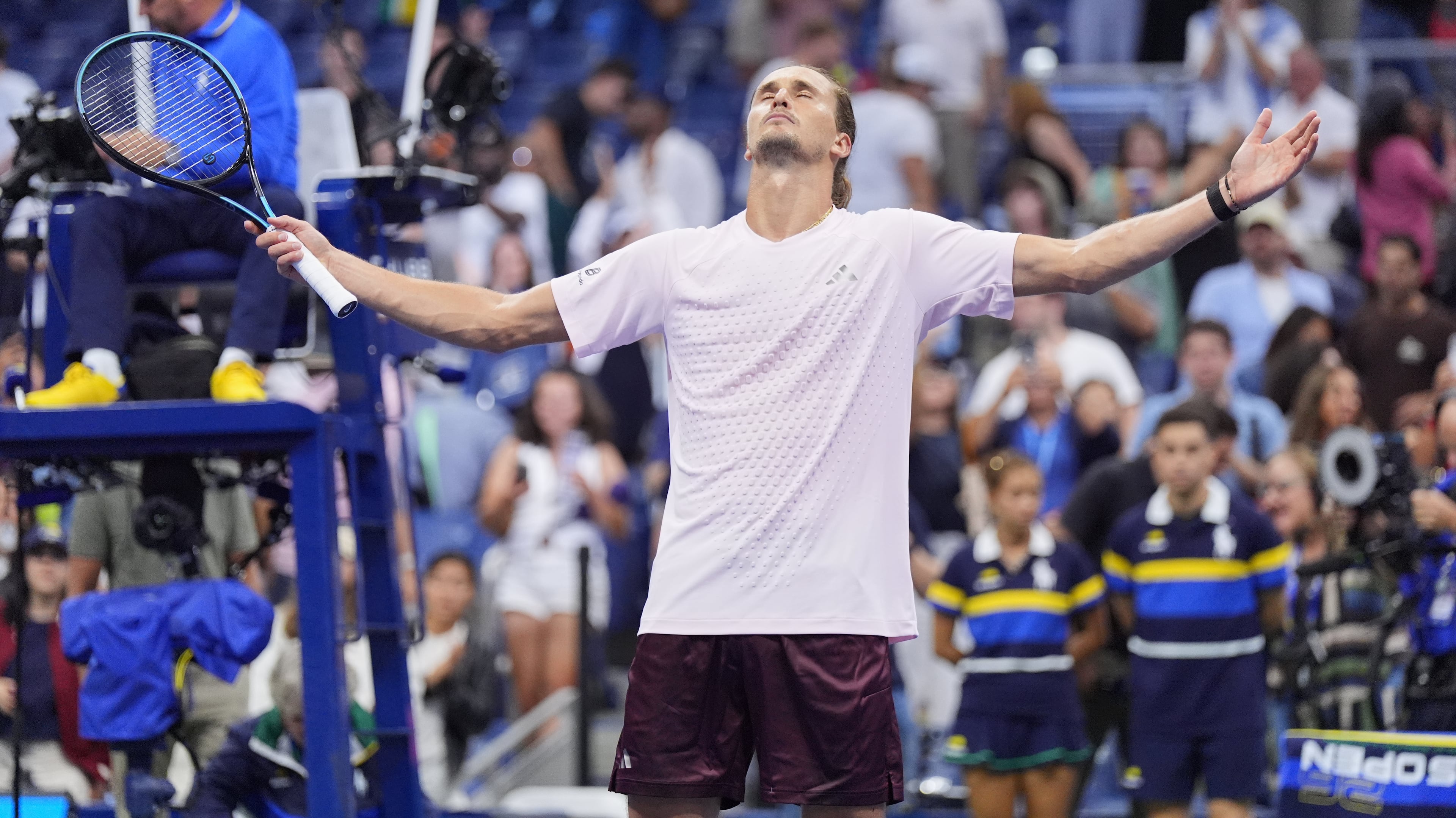 Alexander Zverev, of Germany, celebrates defeating Lorenzo Sonego, of Italy, in five sets In the first round of the U.S. Open tennis championships early Wednesday, Sept. 2, 2026, in New York. (AP Photo/Frank Franklin II)