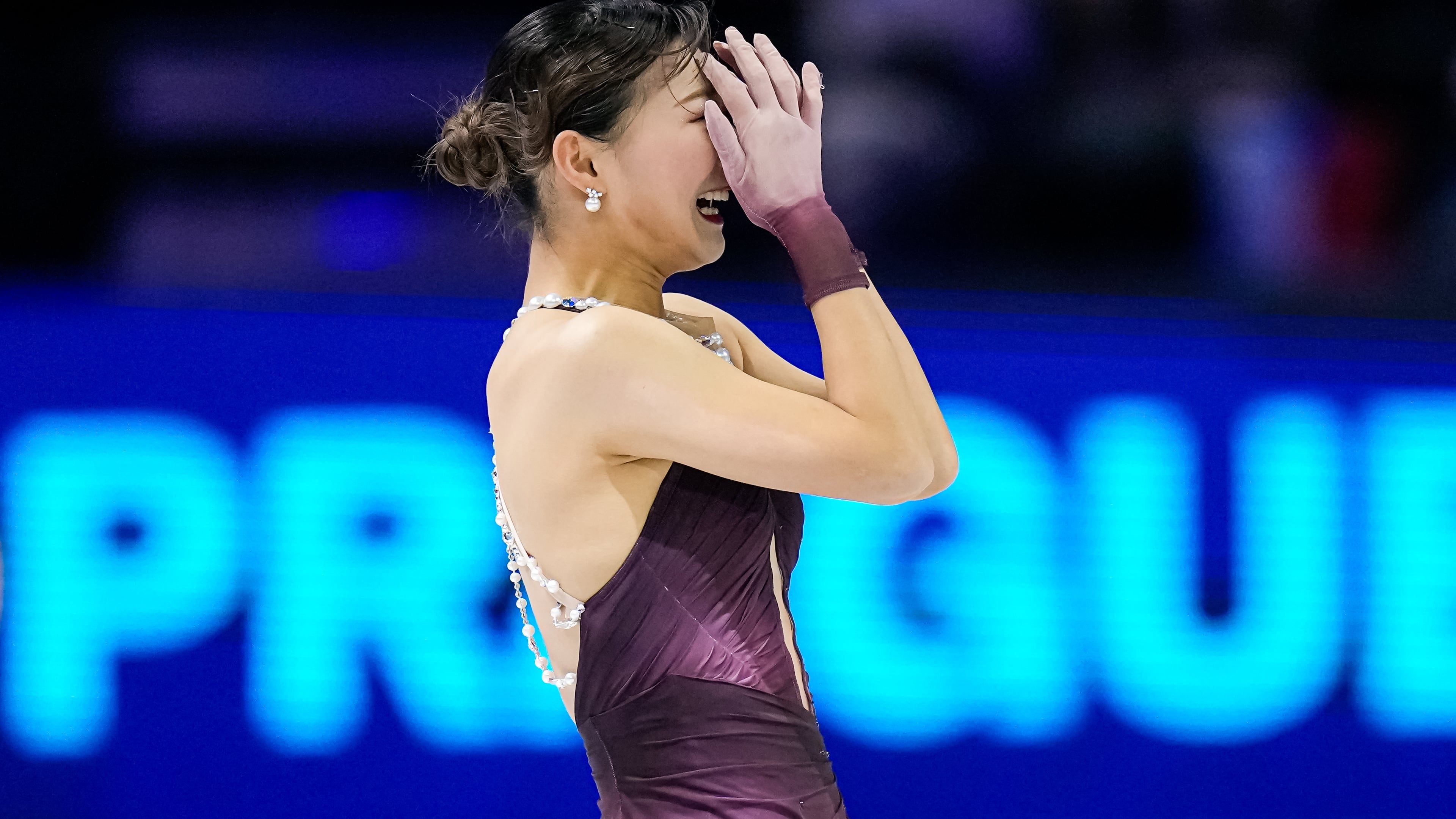 Kaori Sakamoto from Japan reacts at the end of her routine during the women free skating at the Figure Skating World Championships in Prague, Czech Republic, Friday, March 27, 2026. (AP Photo/Petr David Josek)