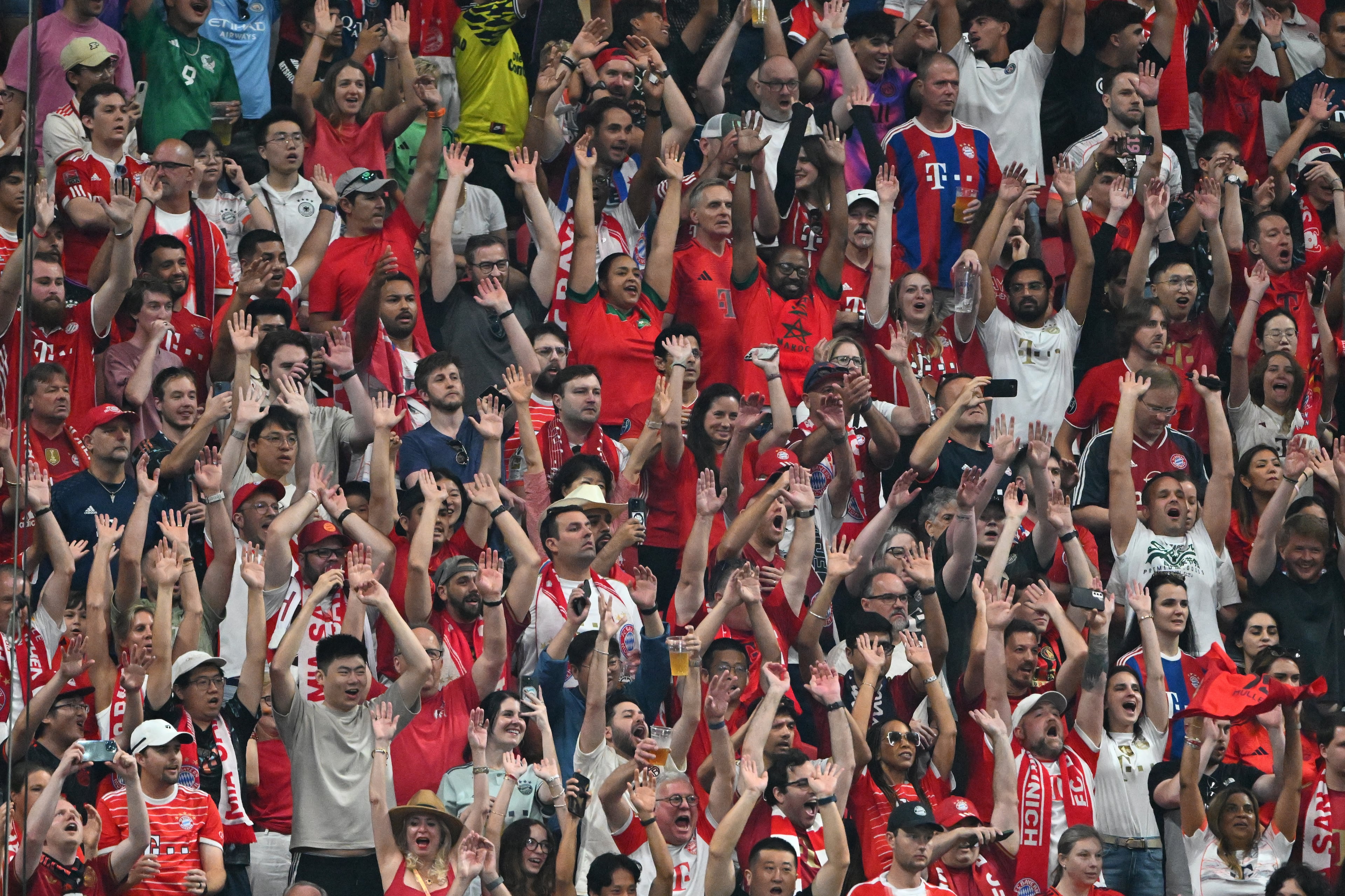 Bayern Munich fans cheer during the second half in Club World Cup quarterfinals match at Mercedes-Benz Stadium, Saturday, July 5, 2025, in Atlanta. Paris Saint-Germain won 2-0 over Bayern Munich. (Hyosub Shin / AJC)