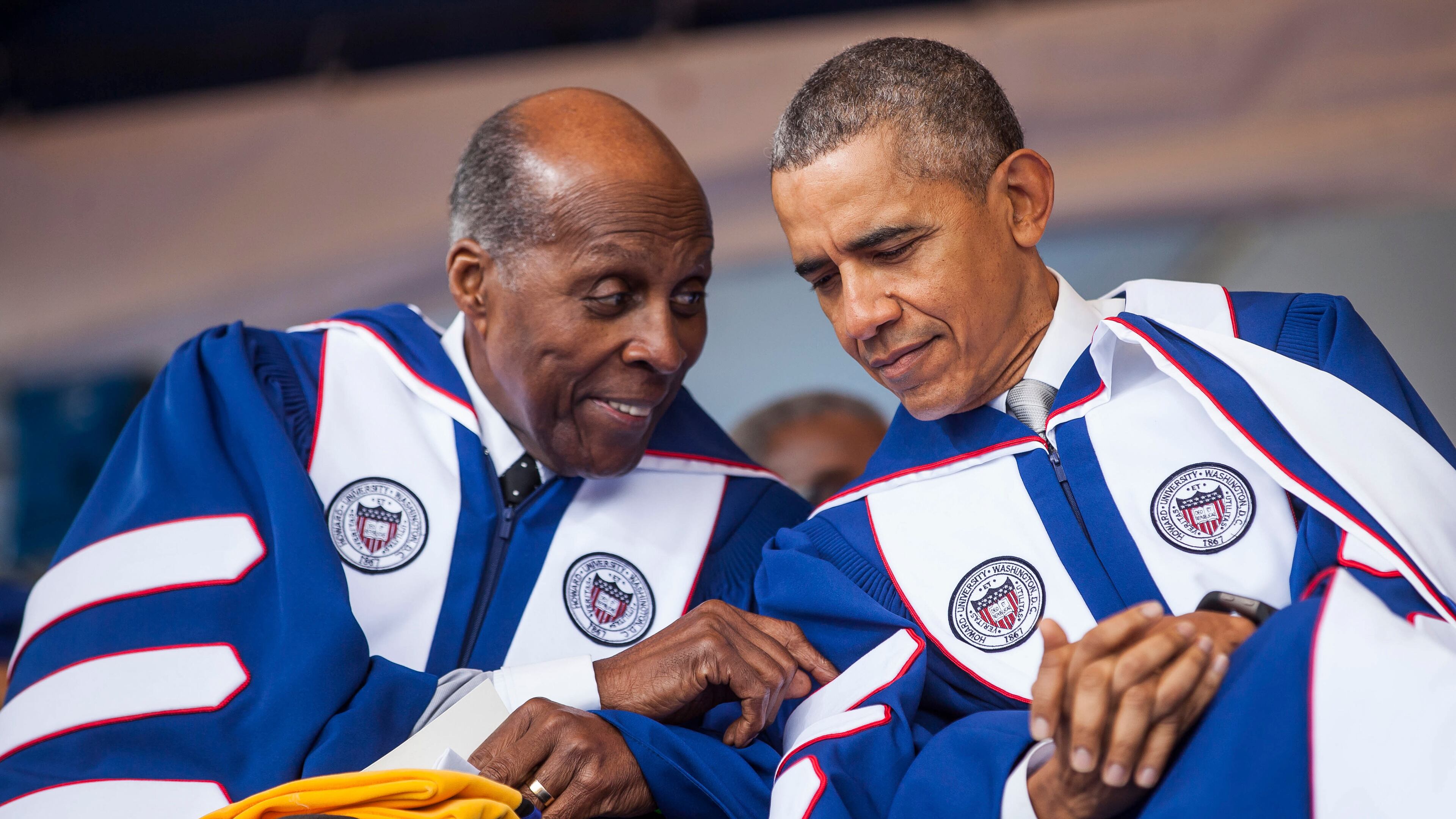 President Barack Obama sits with Vernon Jordan during a commencement ceremony at Howard University in 2016. Jordan, the civil rights activist and Washington power broker whose private counsel was sought both by the powerful at the top levels of government and those in the corporate world, died March 1. He was 85. (Zach Gibson/The New York Times)