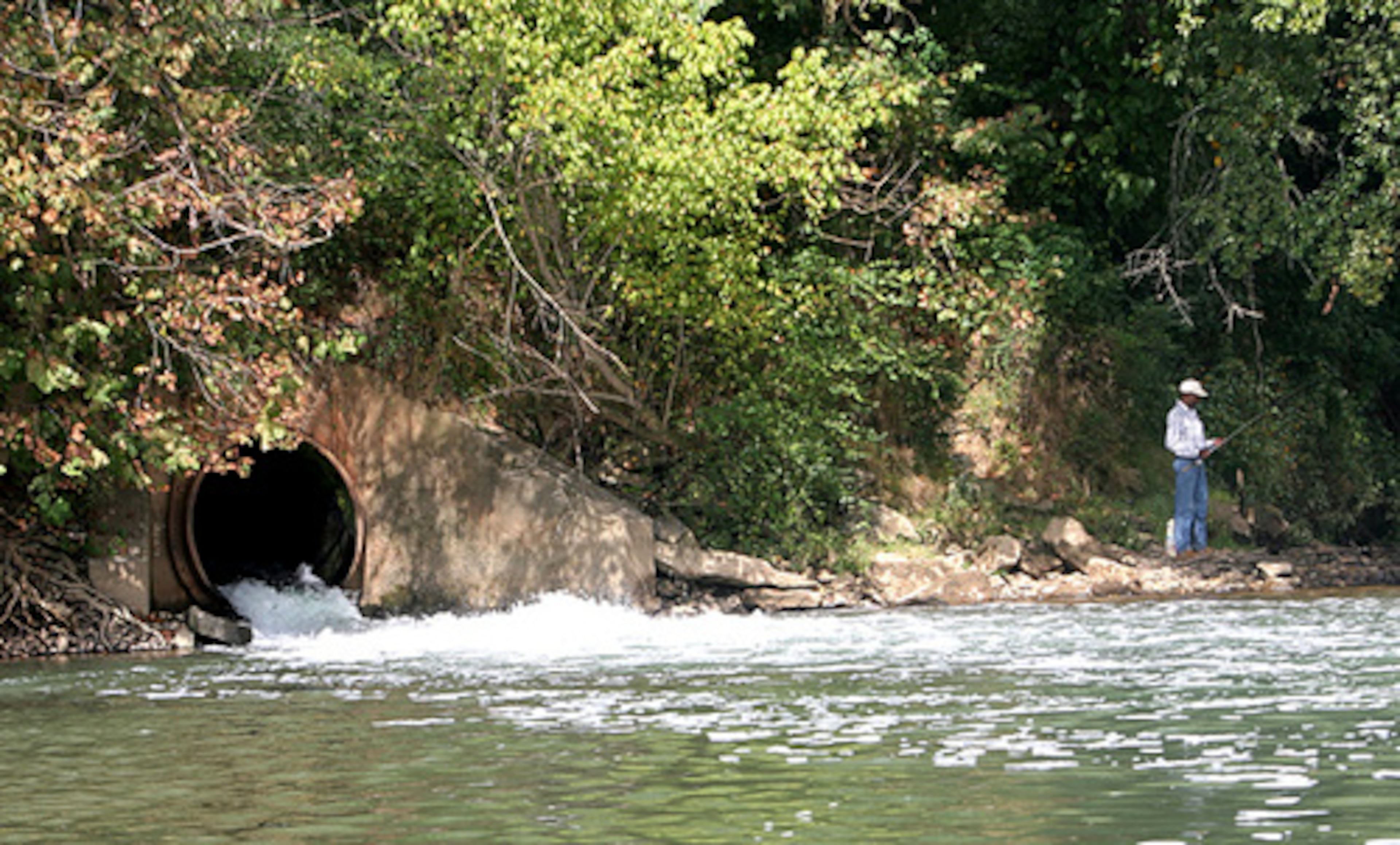 A man fishes in the Chattahoochee just upstream of a pipe discharging water from the R.L. Sutton Water Reclamation Facility near Smyrna.(Courtesy)