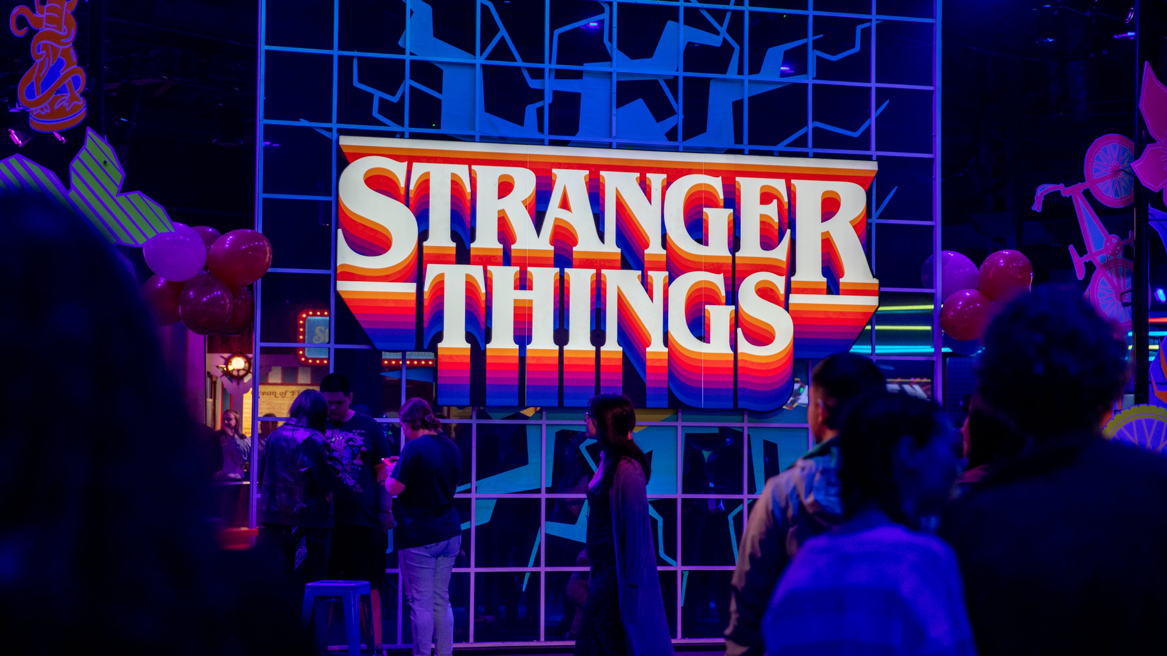 "Stranger Things: The Experience" at Pullman Yards ends in the Mix-Tape lounge where pizza, ice cream, cocktails, merchandise and photo opportunities are available. (Jenni Girtman for The Atlanta Journal-Constitution)