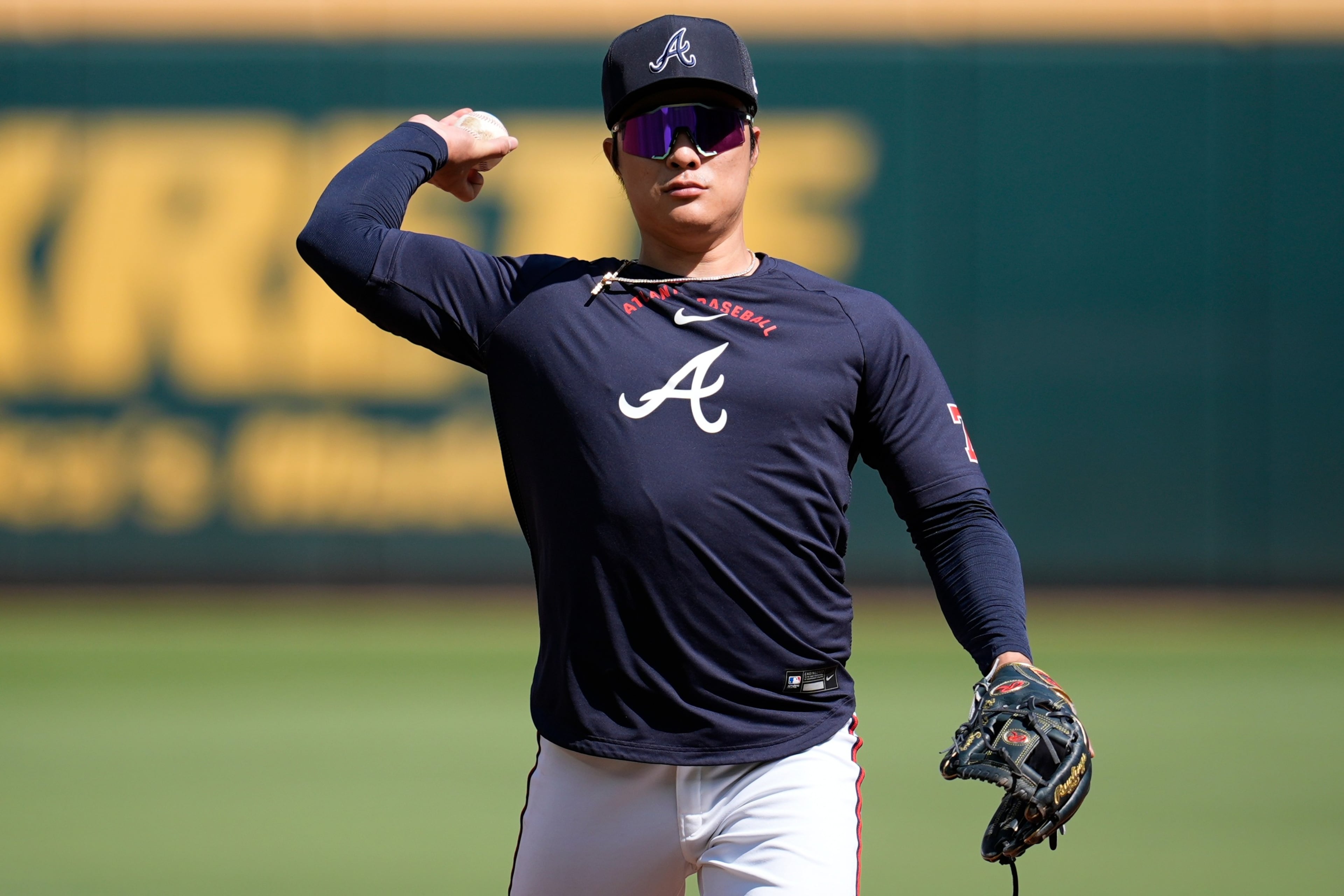 Shortstop Ha-Seong Kim warms up before a game earlier this month. (Mike Stewart/AP)