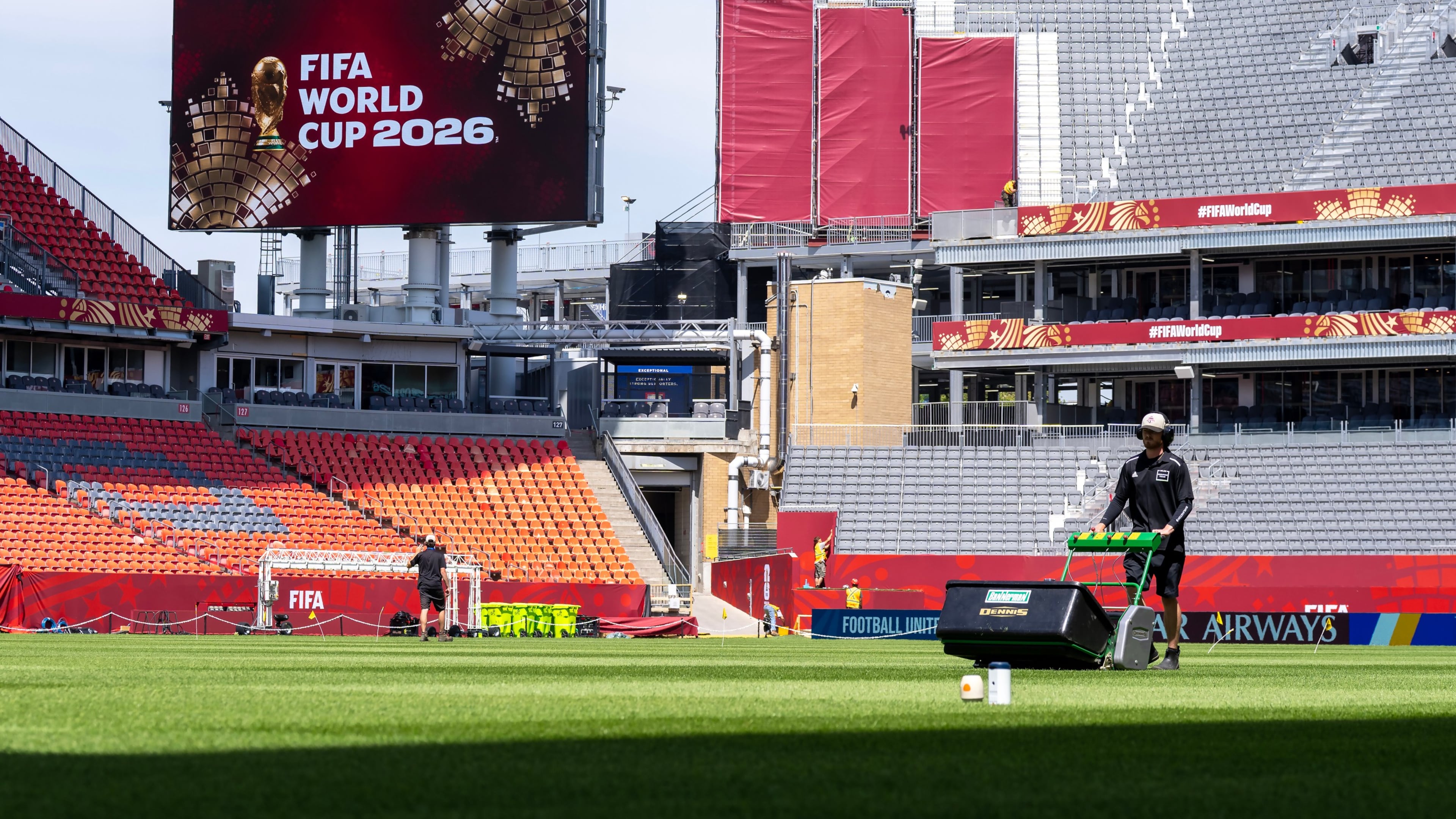 A worker mows the grass at Toronto Stadium, Thursday June 4, 2026, in Toronto, in preparation for World Cup soccer tournament. (Frank Gunn/The Canadian Press via AP)