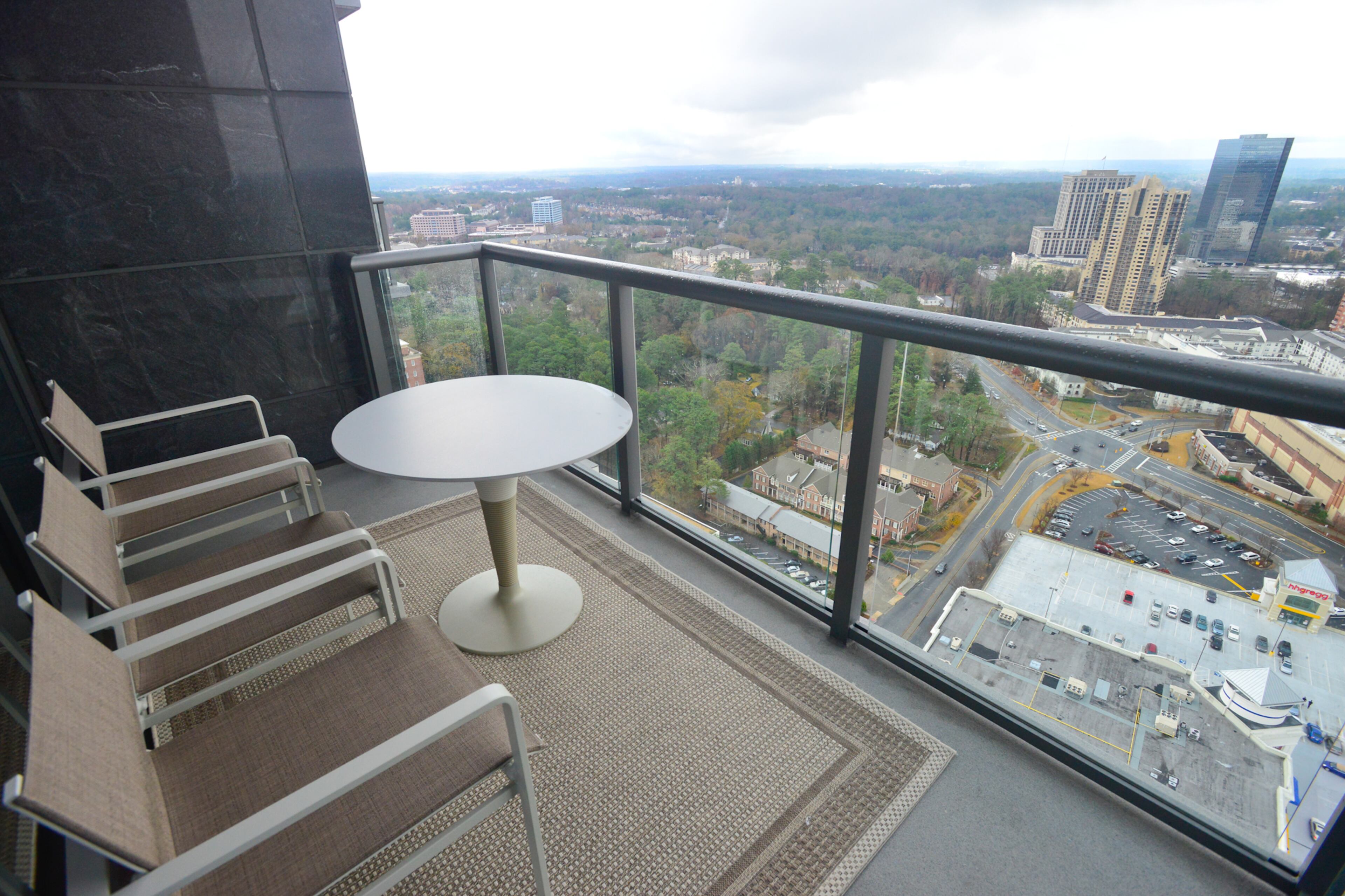 The condo's floor-to-ceiling windows provides what Mark Kanov calls "incredible" views, but when the Kanovs want to some fresh air or check out the Buckhead skyline, they can step on a covered balcony.